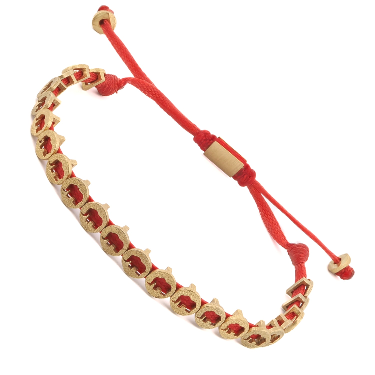 Adjustable red bracelet adorned with 18K gold-plated brass elephant charms for a stylish and meaningful look.
