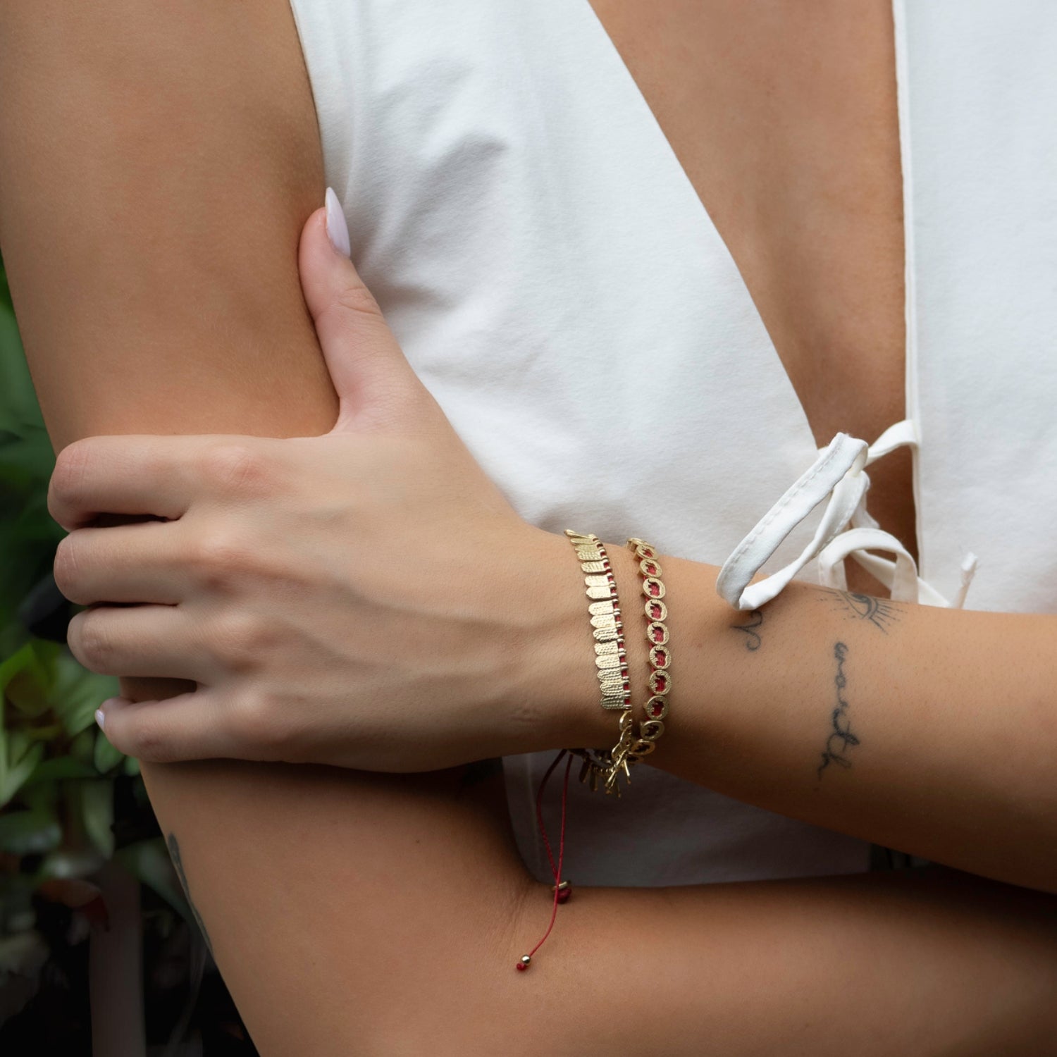 Chic Lucky Elephant Bracelet featuring red jewelry rope and protective gold elephant charms.
