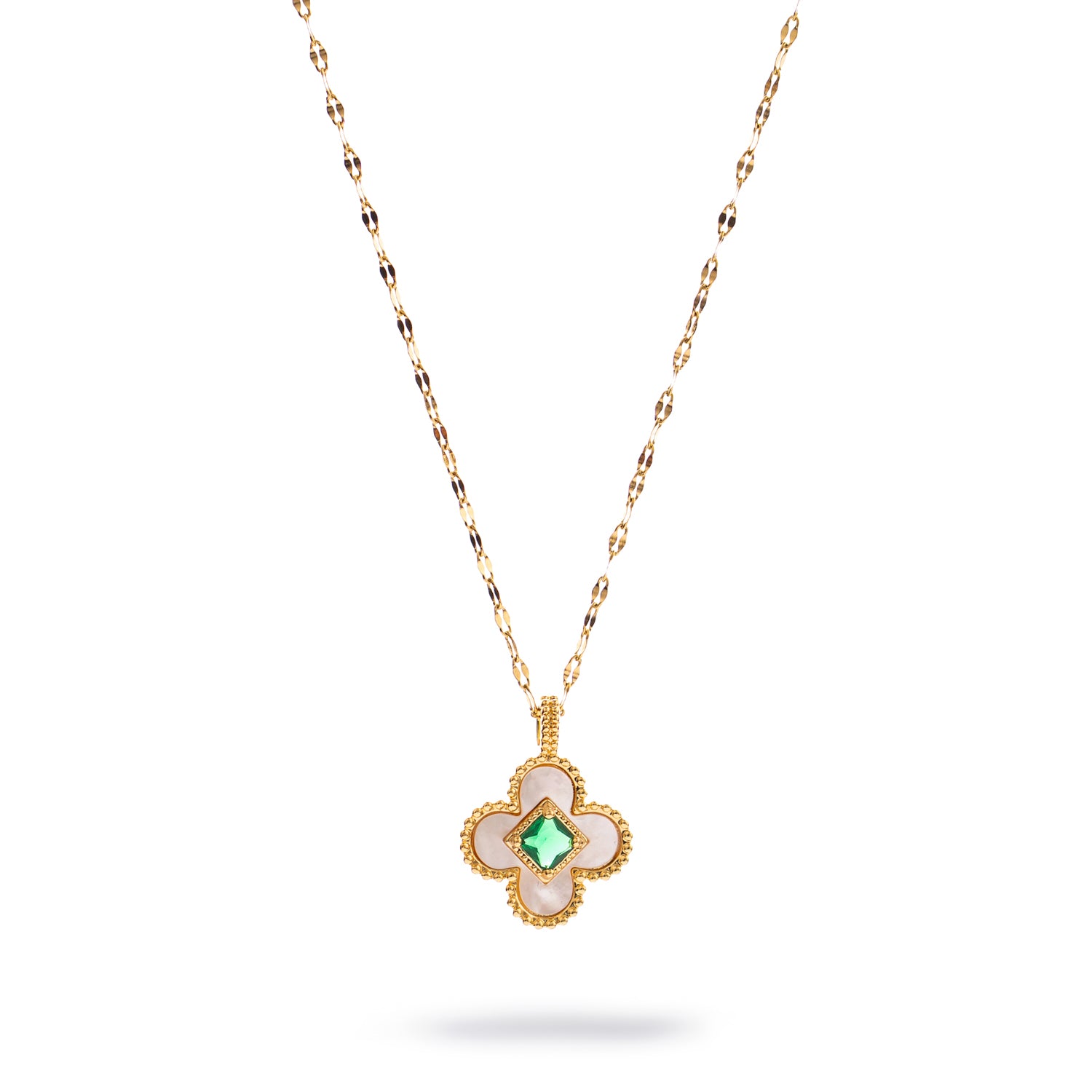 Gold necklace with mother-of-pearl clover pendant and green center stone