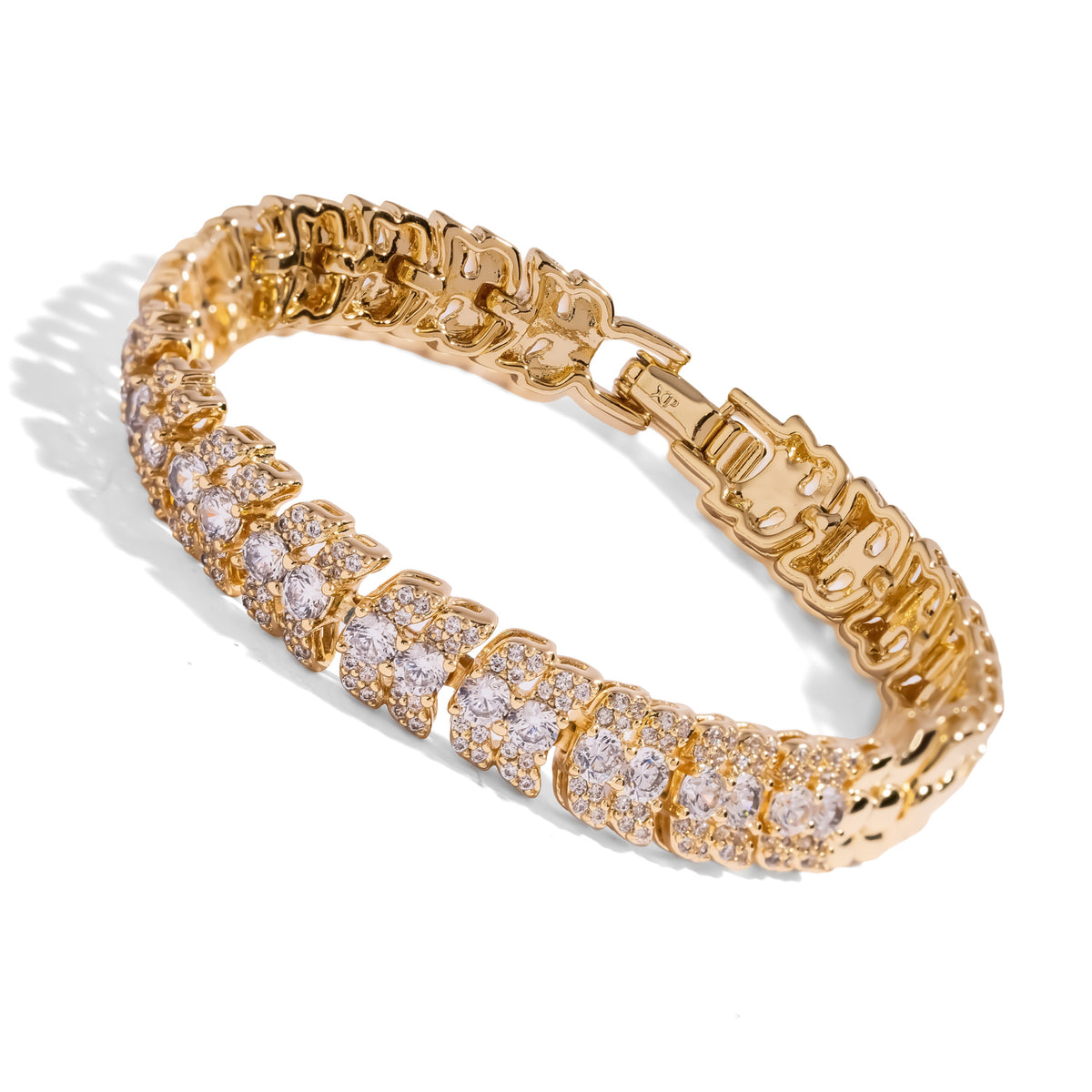 Angled view of the Luminous Halo pave zircon gold tennis bracelet on white