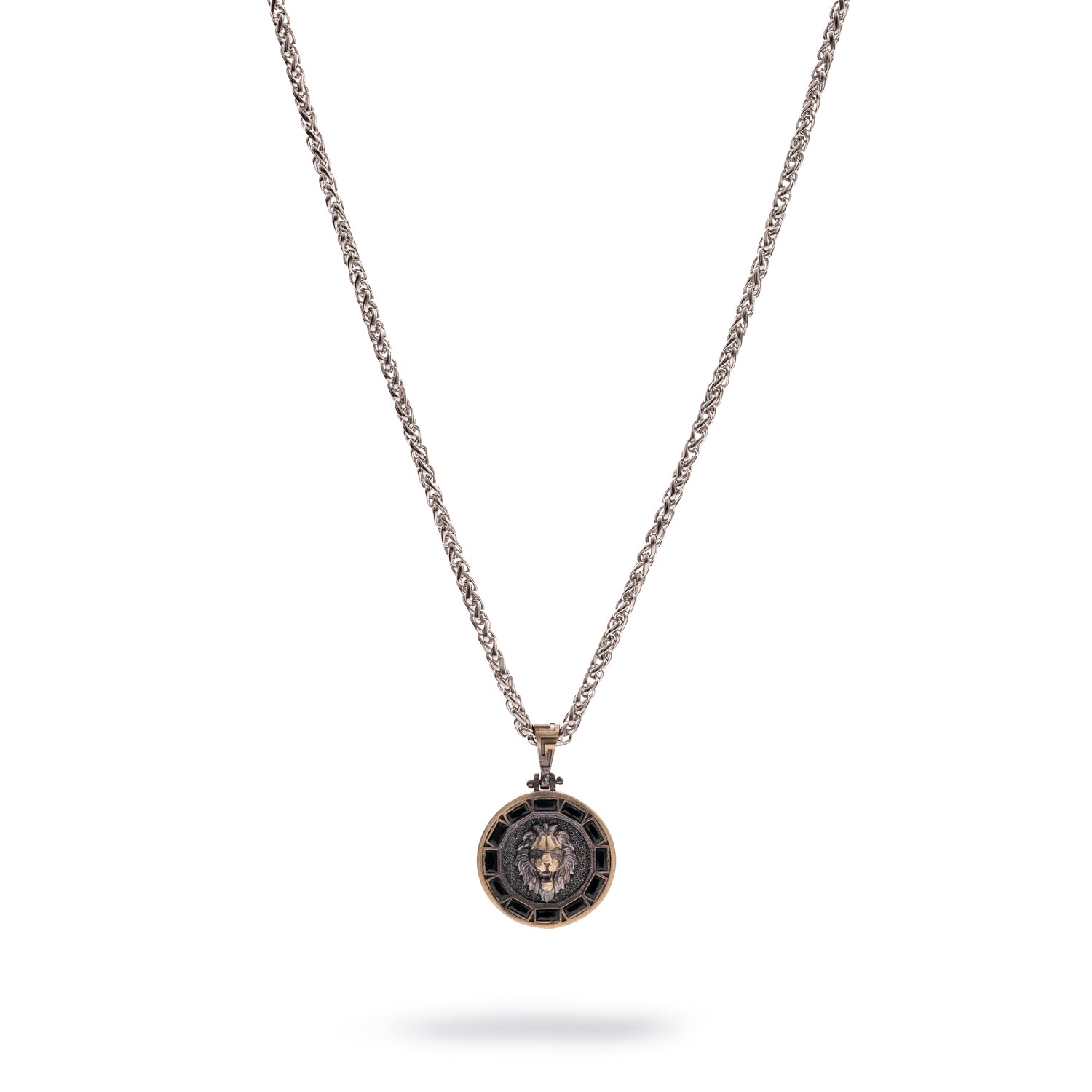 Sterling silver necklace with lion medallion pendant, pavé black CZ diamond eyes, rhodium finish, geometric features, masculine statement style.