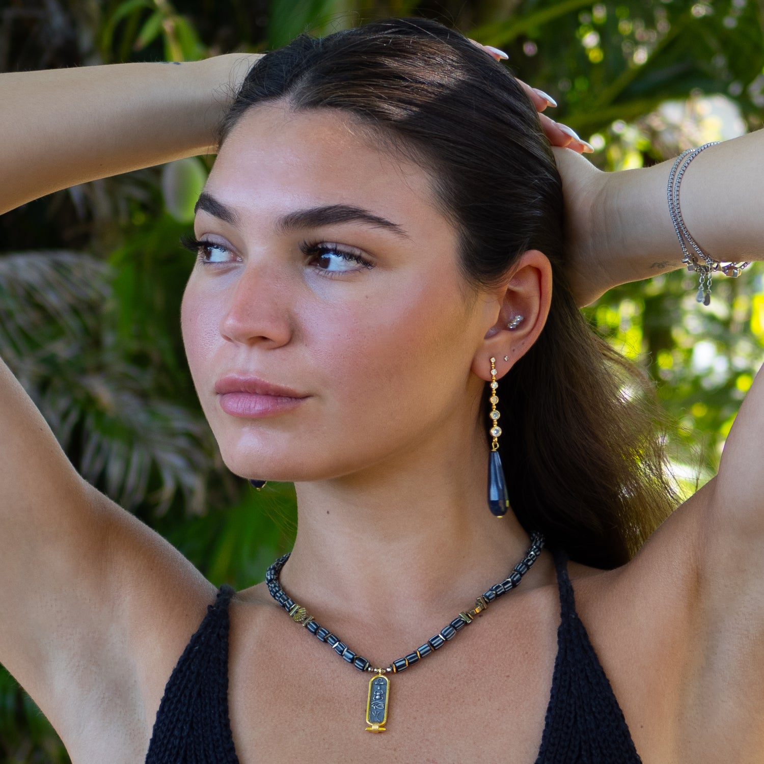 Handmade teardrop sodalite earrings with gold-plated bronze and sparkling CZ accents

