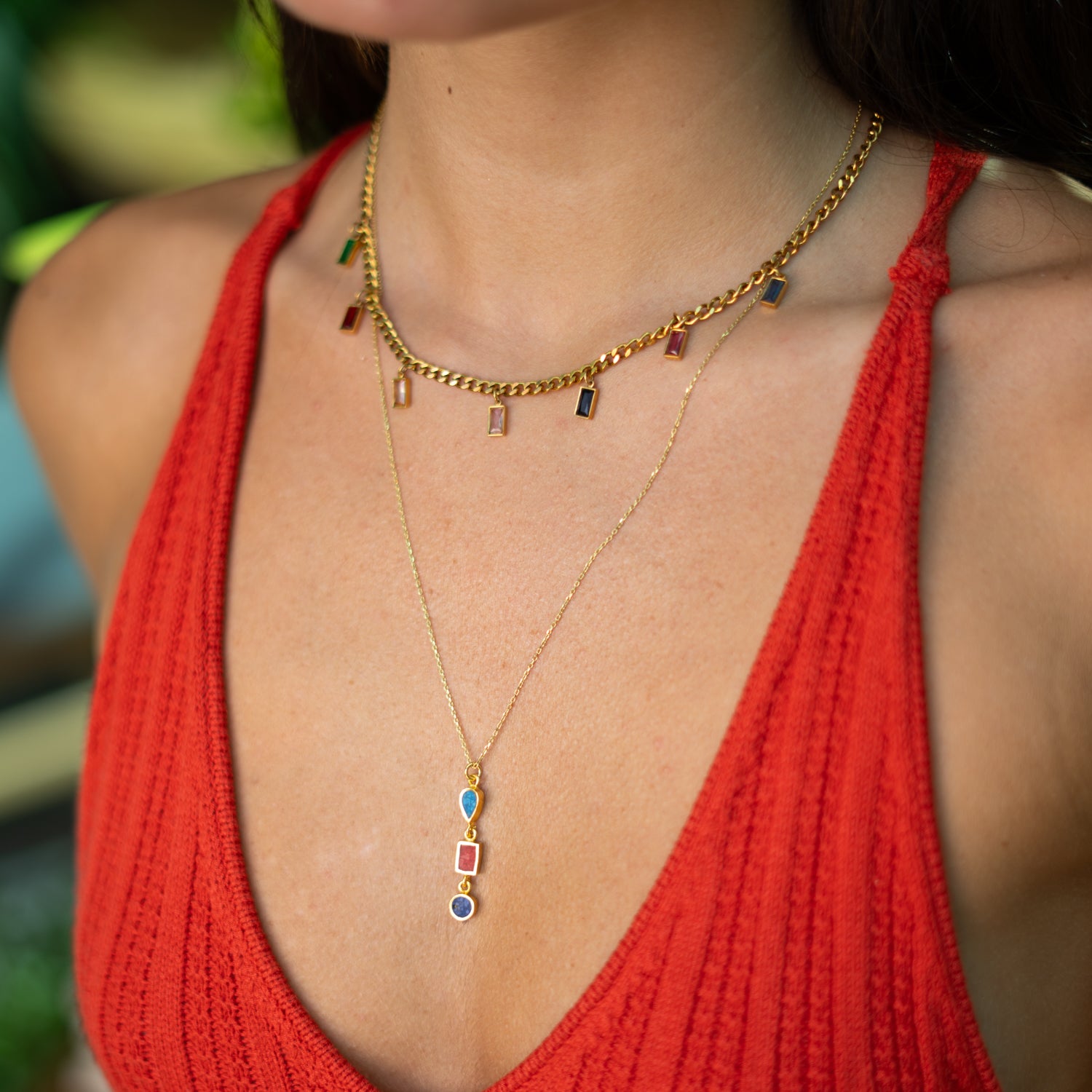 Bold gold-toned choker with colorful dangling crystals
