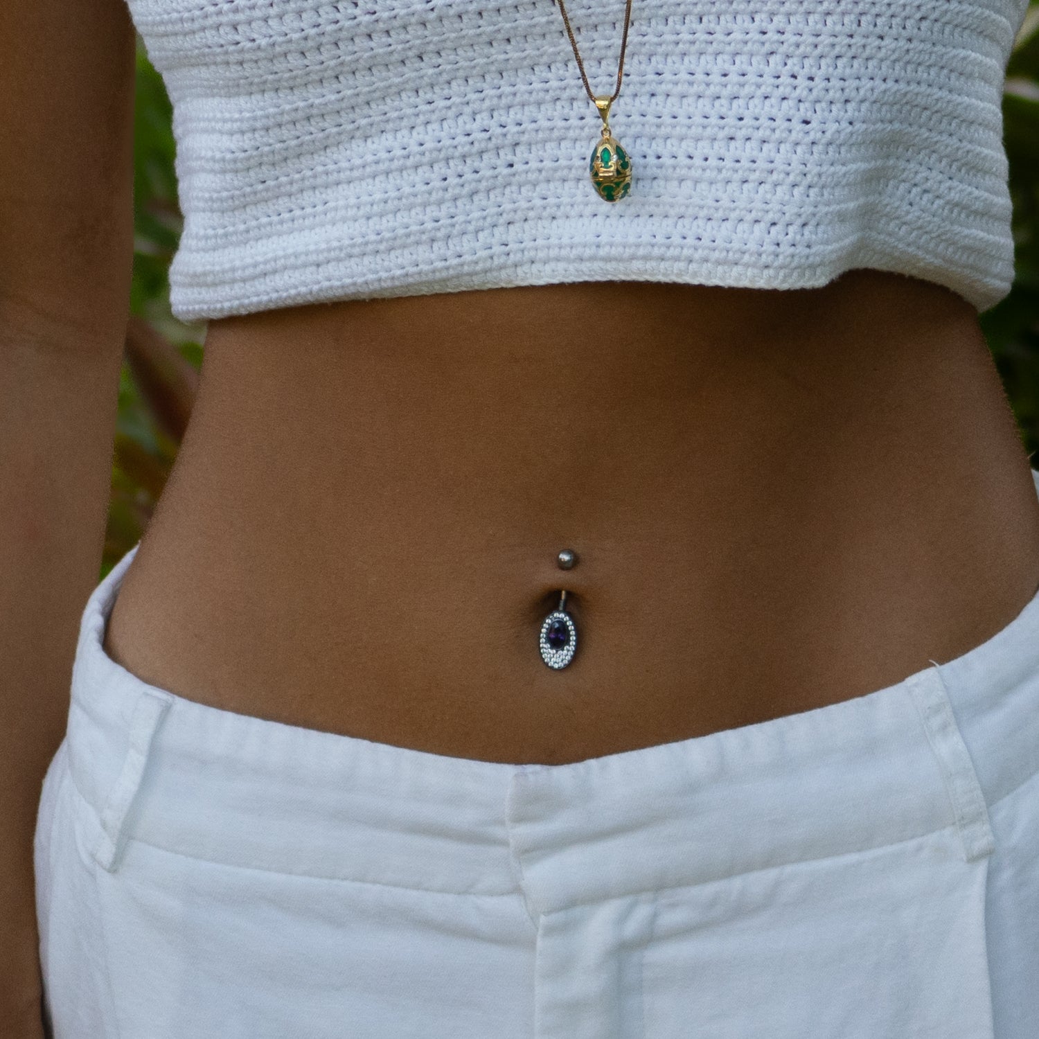 Sterling silver belly piercing with oval mystic amethyst gemstone, CZ diamond accents, rhodium-plated finish, vibrant purple, elegant style.