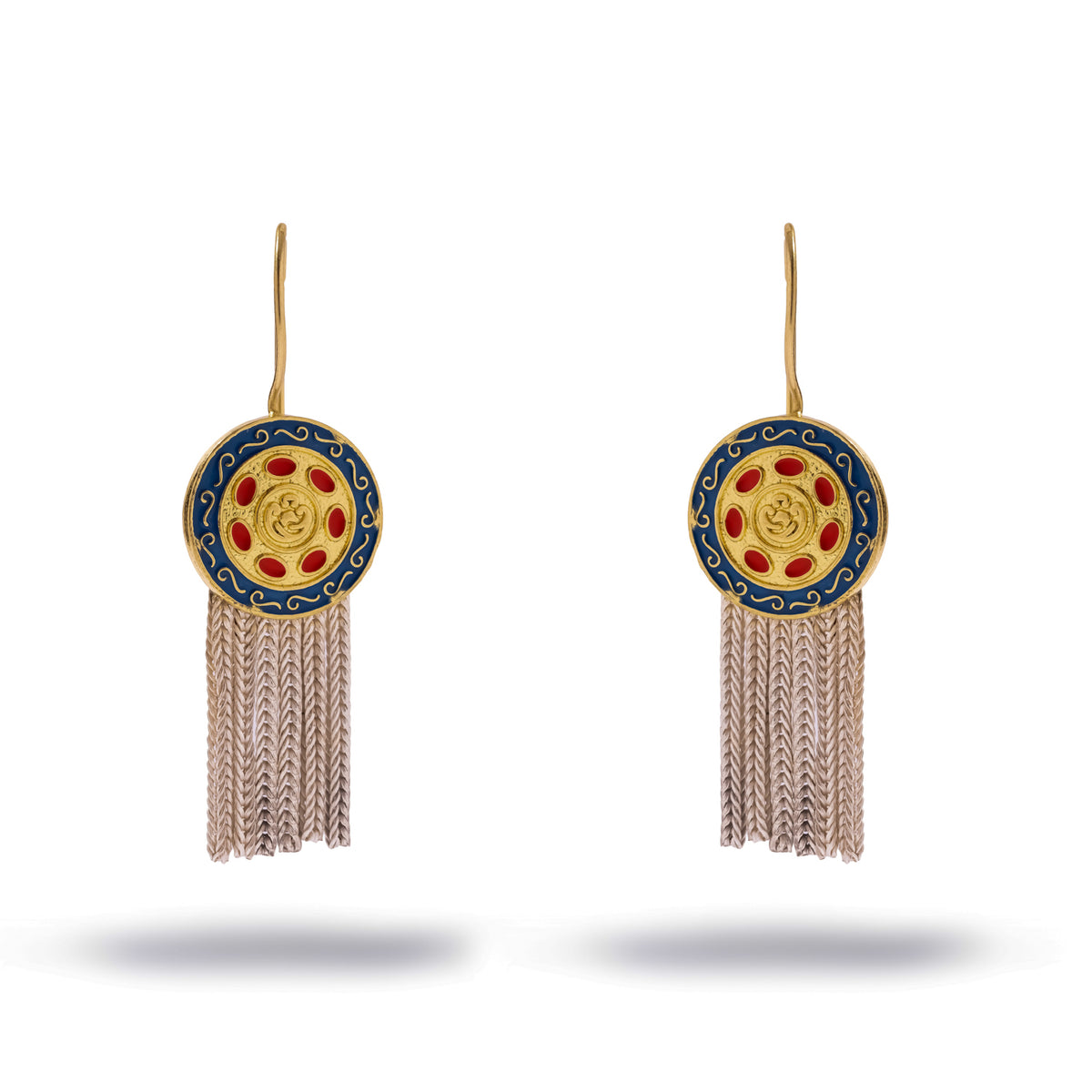 Pair of Mystic Bloom enamel medallion earrings on white, a gold medallion with red petals and a cobalt blue ring above a silver chain tassel