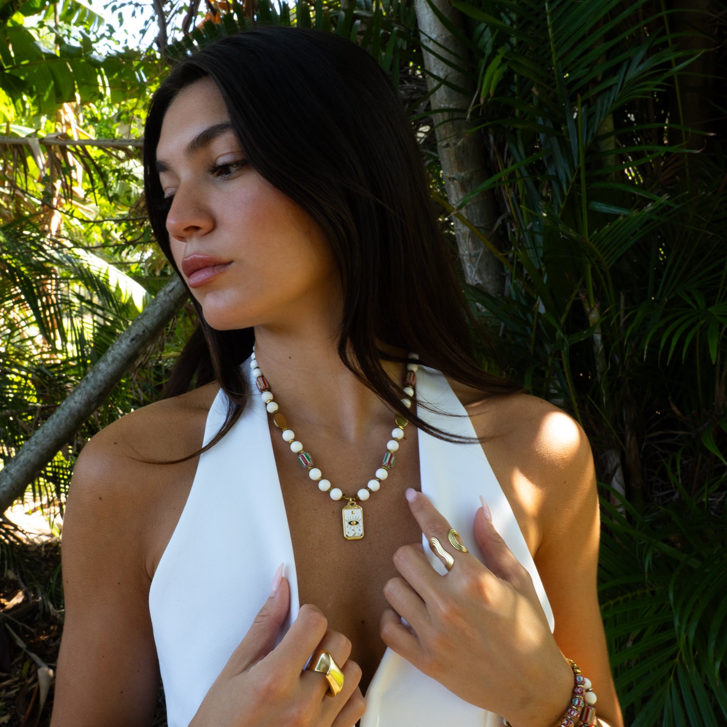 Model wearing spiritual white jade evil eye tarot talisman choker