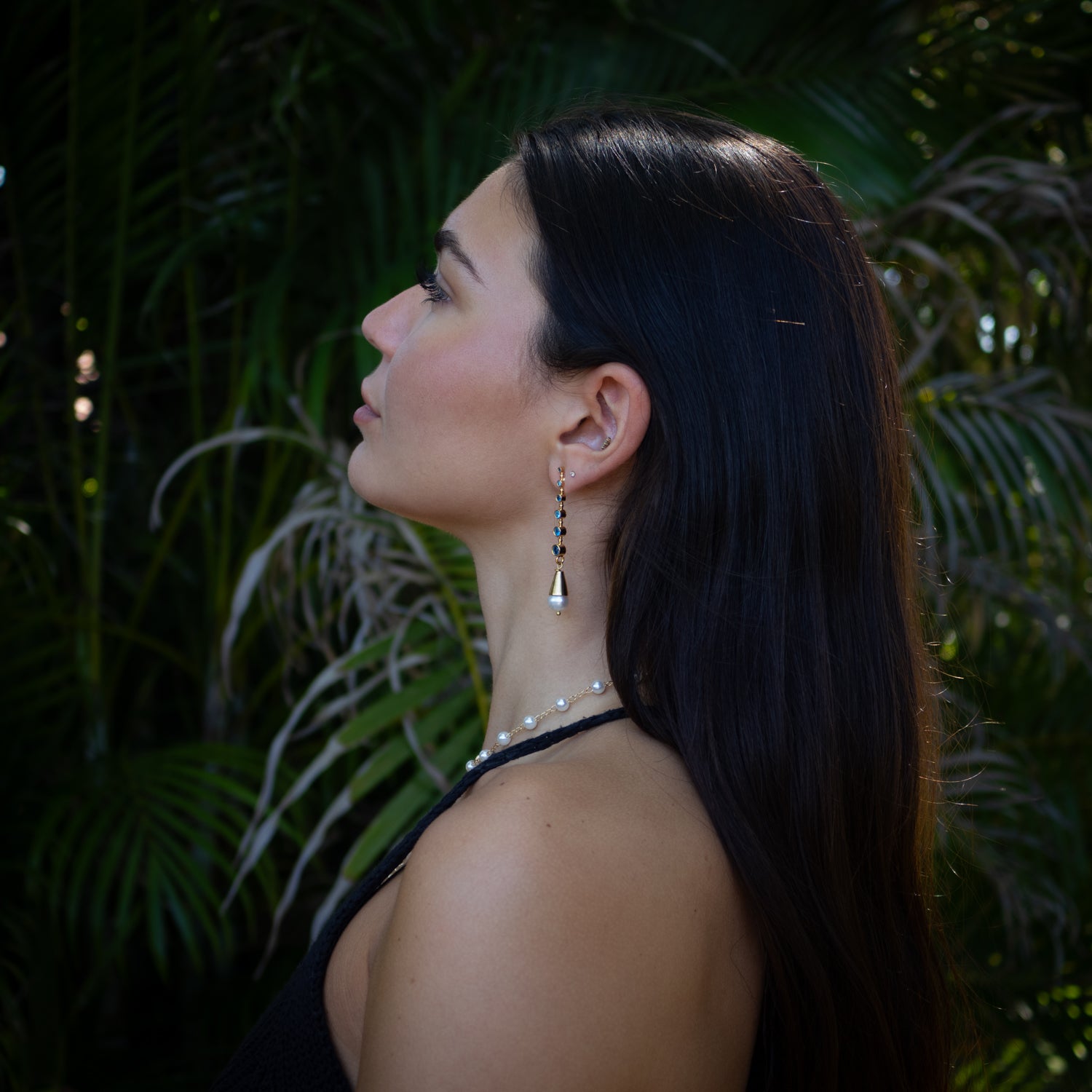 Blue topaz and pearl dangle earrings symbolizing peace, wisdom, and celestial energy

