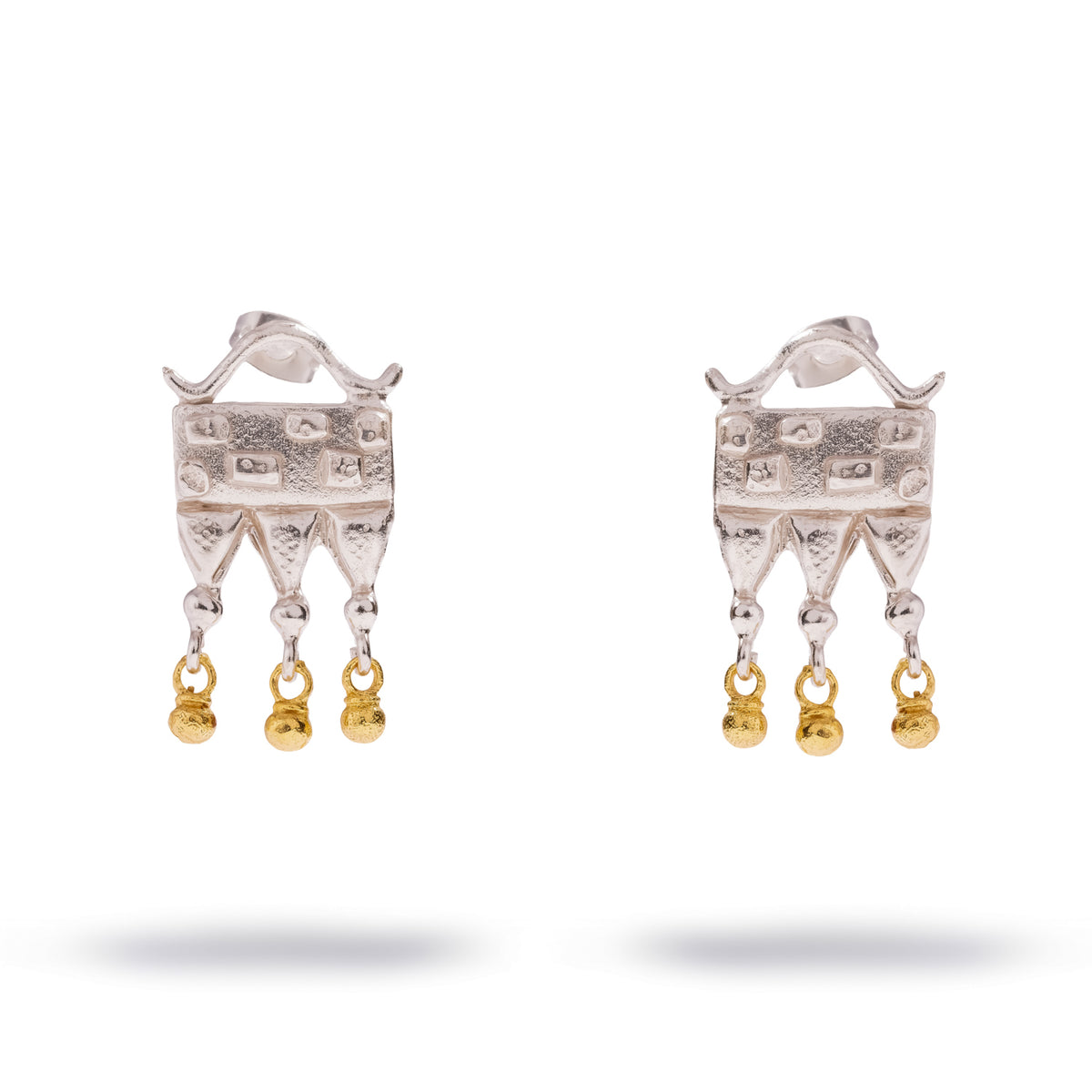 Mystic Temple Two Tone Silver Statement Earrings on white, front view of the textured silver plate and gold bead drops