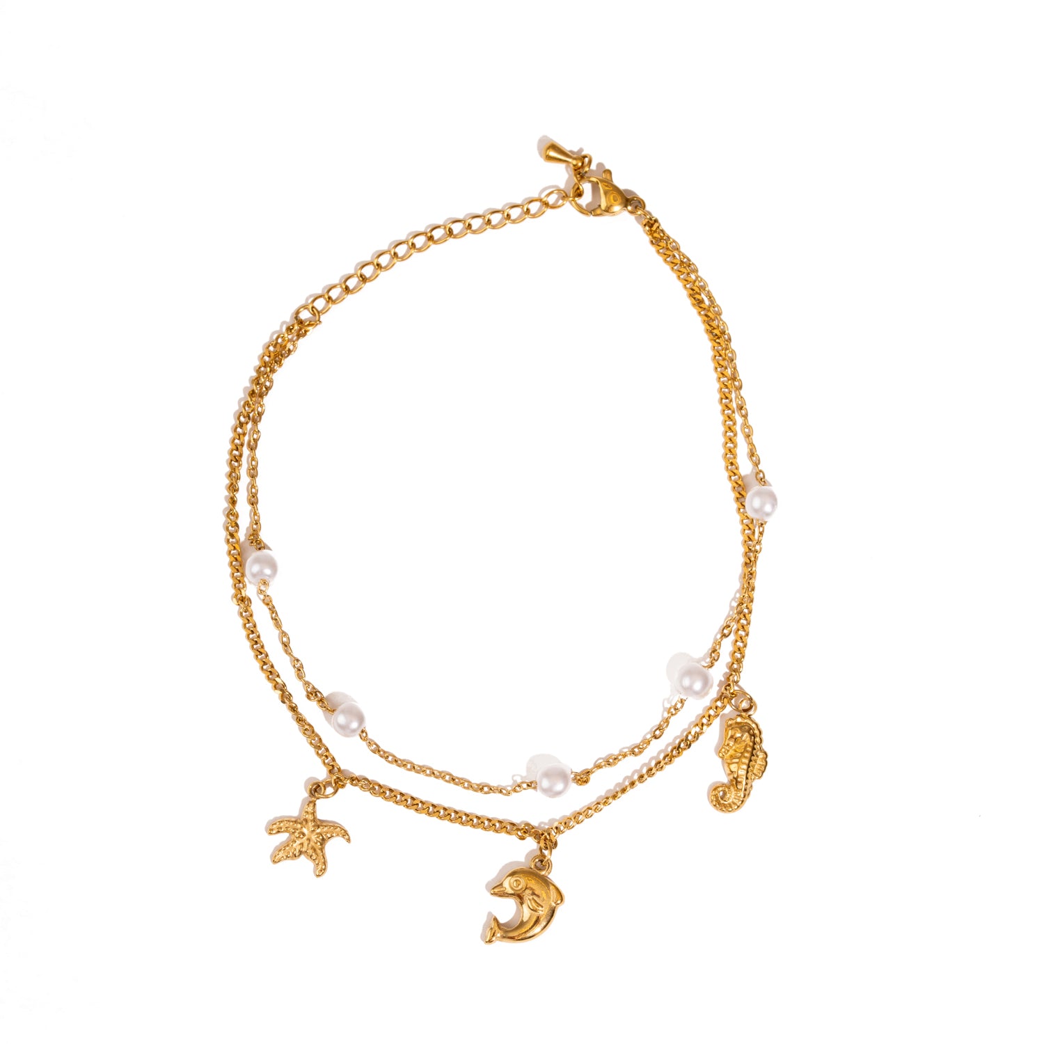 Handmade gold anklet with ocean spirit charms and double chain design