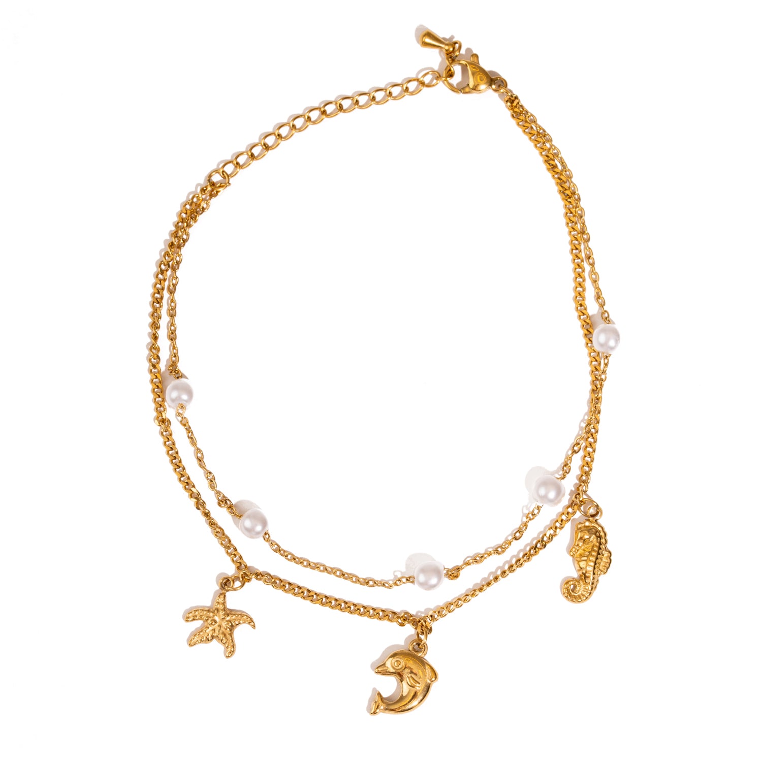 Gold double chain anklet with dolphin, seahorse, and starfish charms