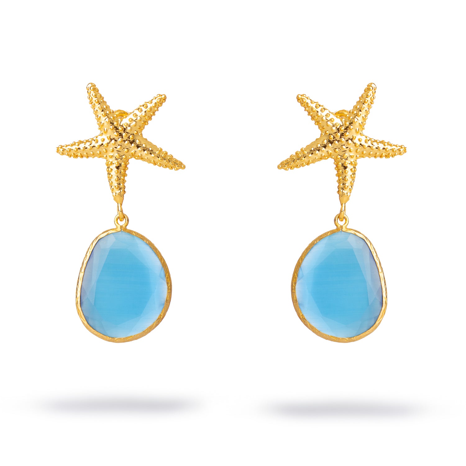 Ocean-inspired gold starfish earrings with blue cat eye gemstone