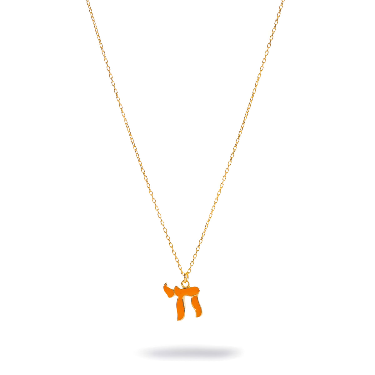 Orange Chai Symbol Gold Pendant Necklace shown at full chain length on white