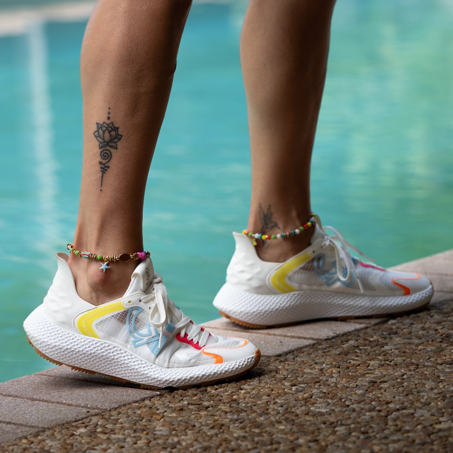 Pastel Dream Star &amp; Fish Tail Beaded Anklet worn on ankle with turquoise water background — handmade charm jewelry