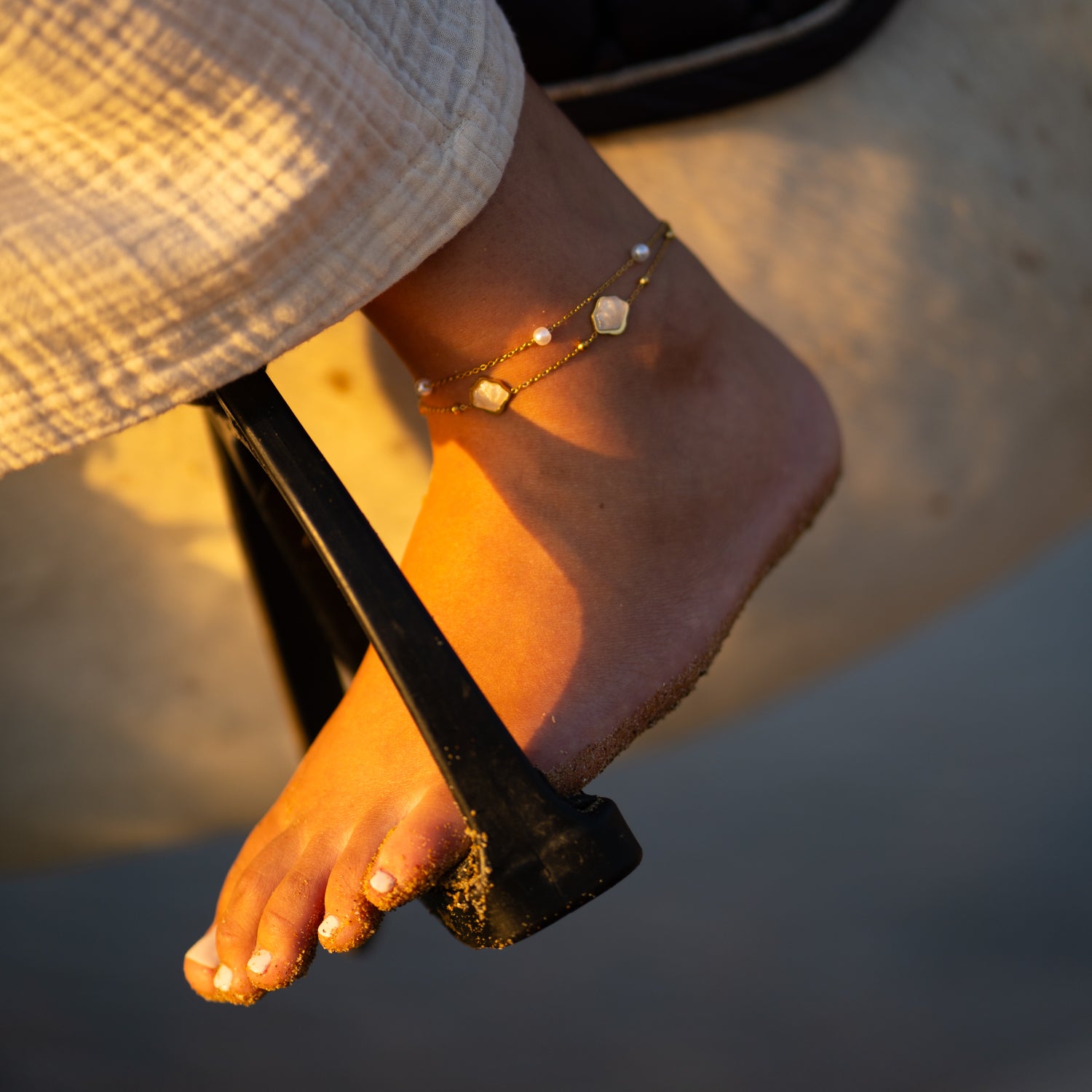 Ocean-inspired gold anklet with pearl and shell accents
