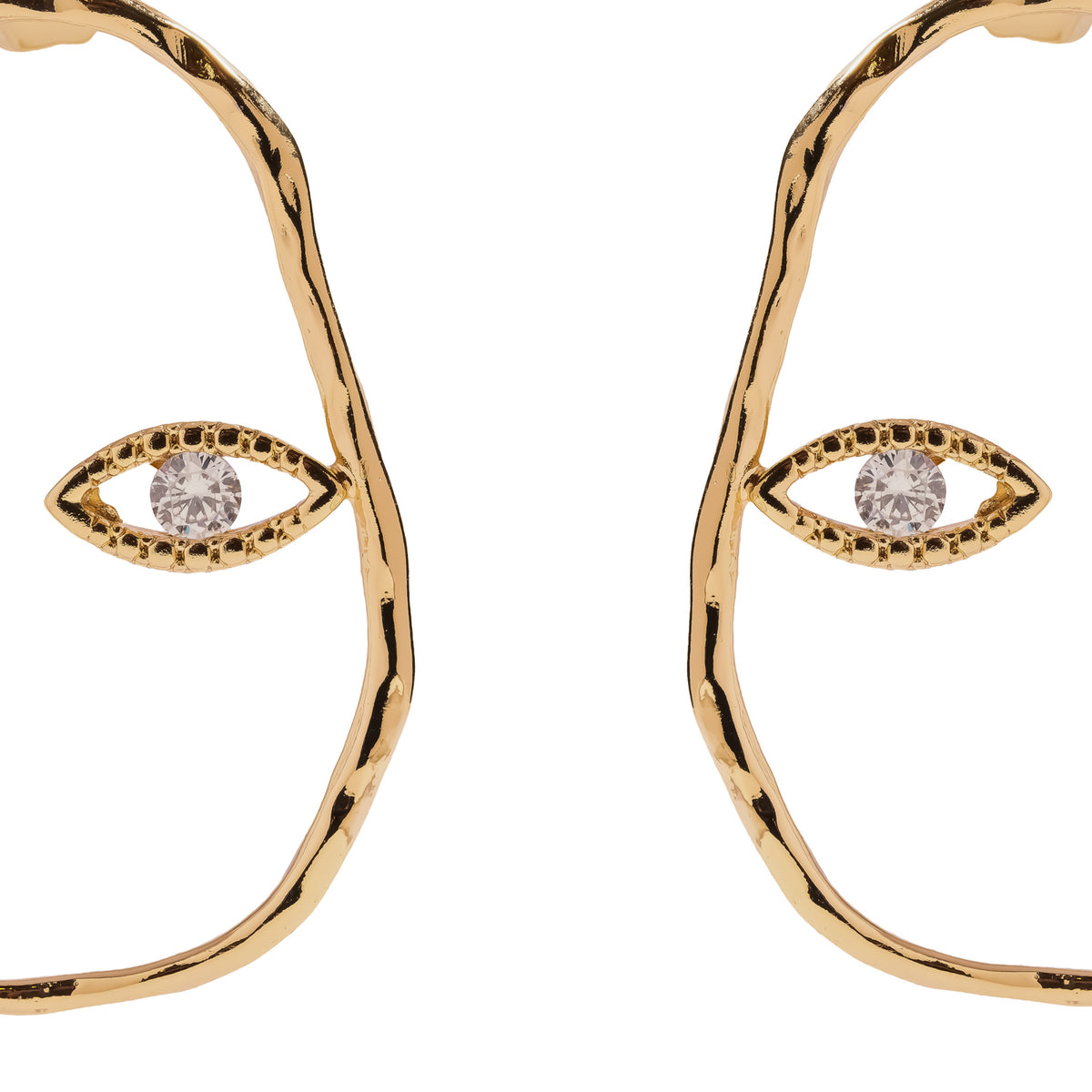 Detail of the marquise shaped evil eye and round cut cubic zirconia set into the hammered gold circle