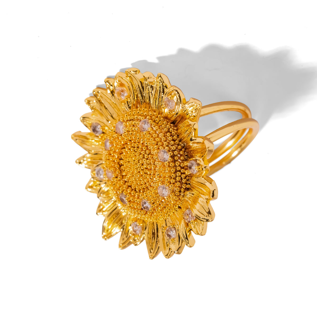 Side view of the Radiant Sunflower ring revealing the adjustable open double band in 24K gold plating