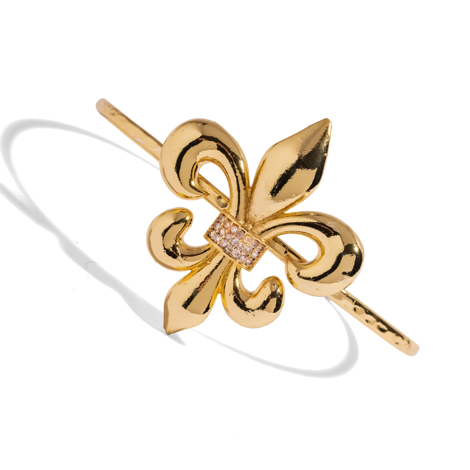 Front view of the Royal Fleur de Lis Crystal Gold Cuff Bracelet showing the pave crystal centerpiece