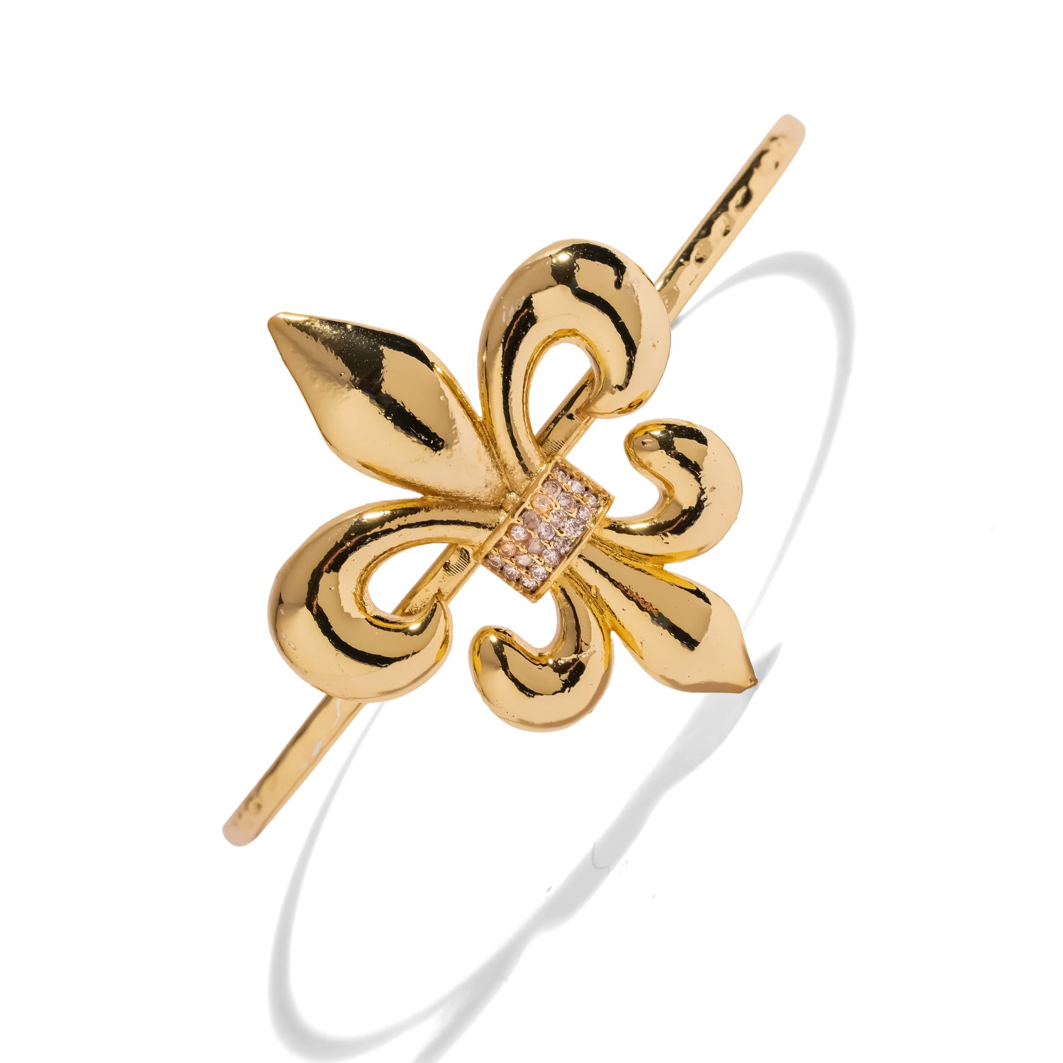 Woman wearing the Royal Fleur de Lis Crystal Gold Cuff Bracelet on her wrist