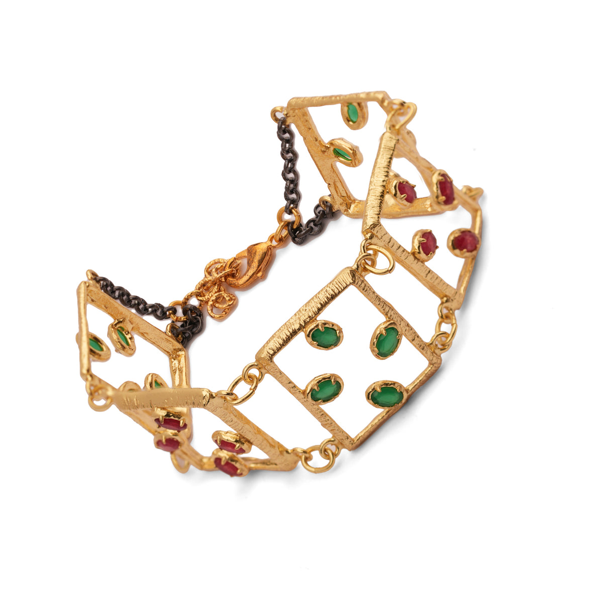Side studio view of the open square gold link bracelet, emerald green gemstones in front and ruby red behind, with the lobster clasp