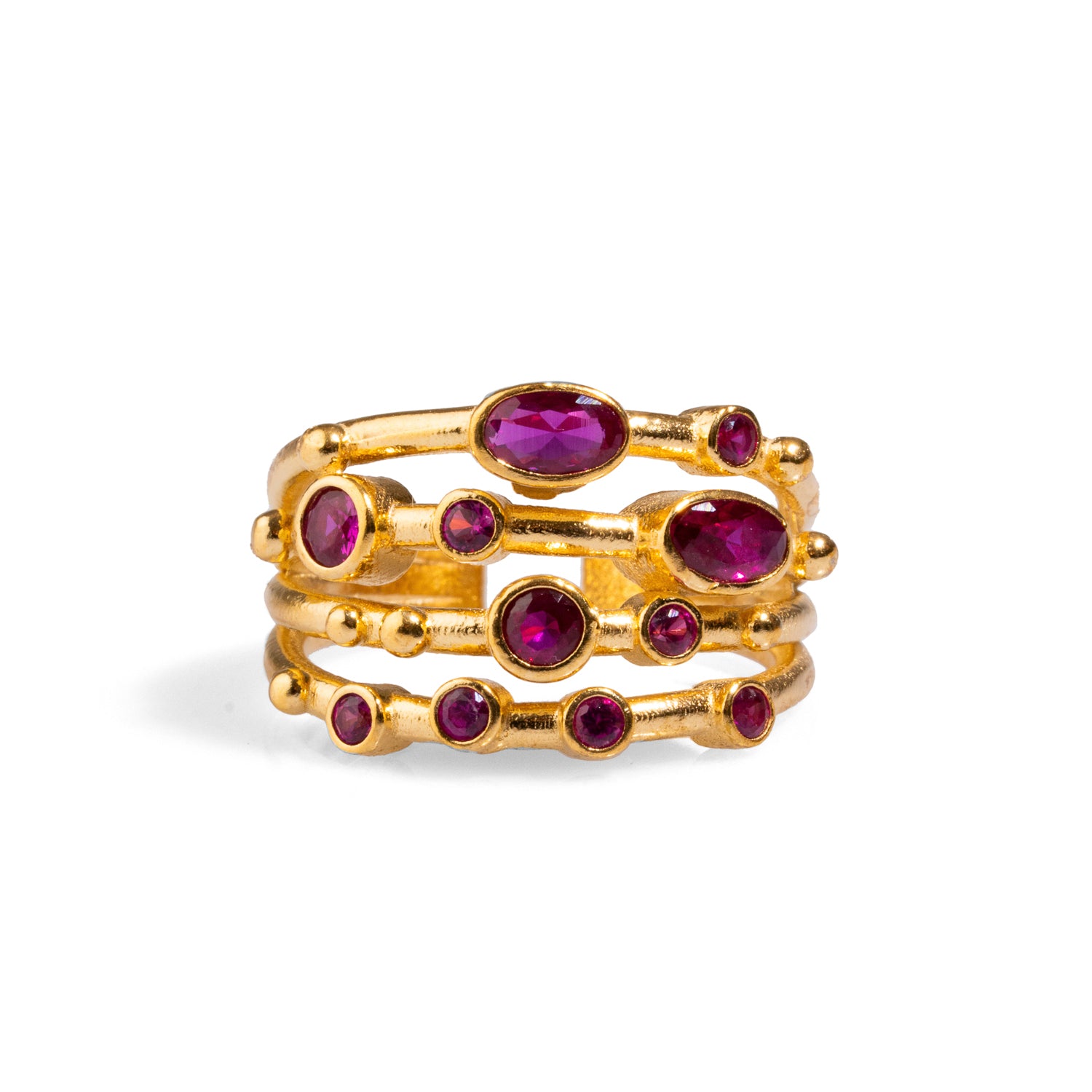 Luxurious adjustable ring featuring an elegant arrangement of ruby stones set in 24k gold-plated brass, combining brilliance and sophistication.
