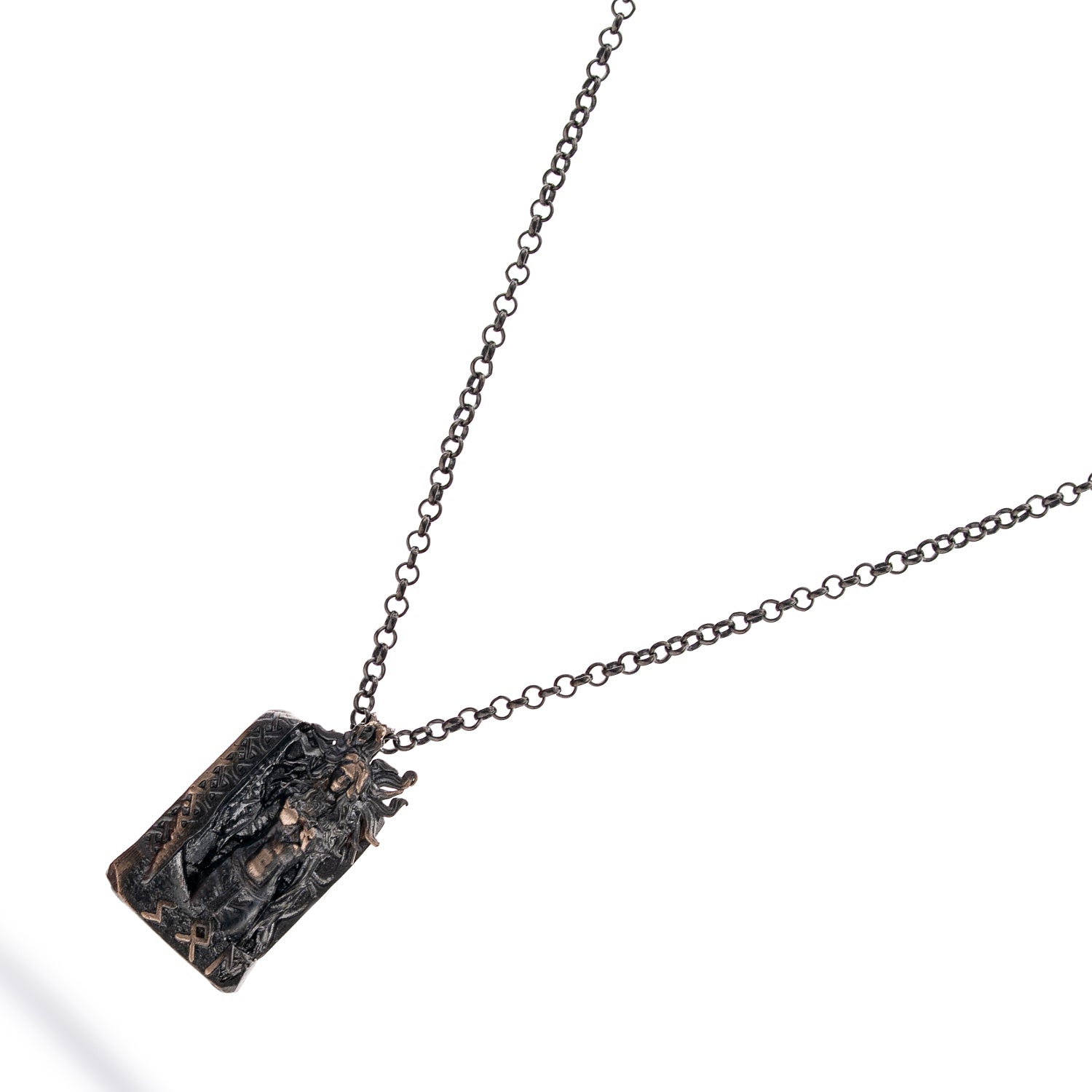 Men’s sterling silver necklace with Santa Muerte pendant, rhodium plating, blackened detailing, and intricate masculine craftsmanship.