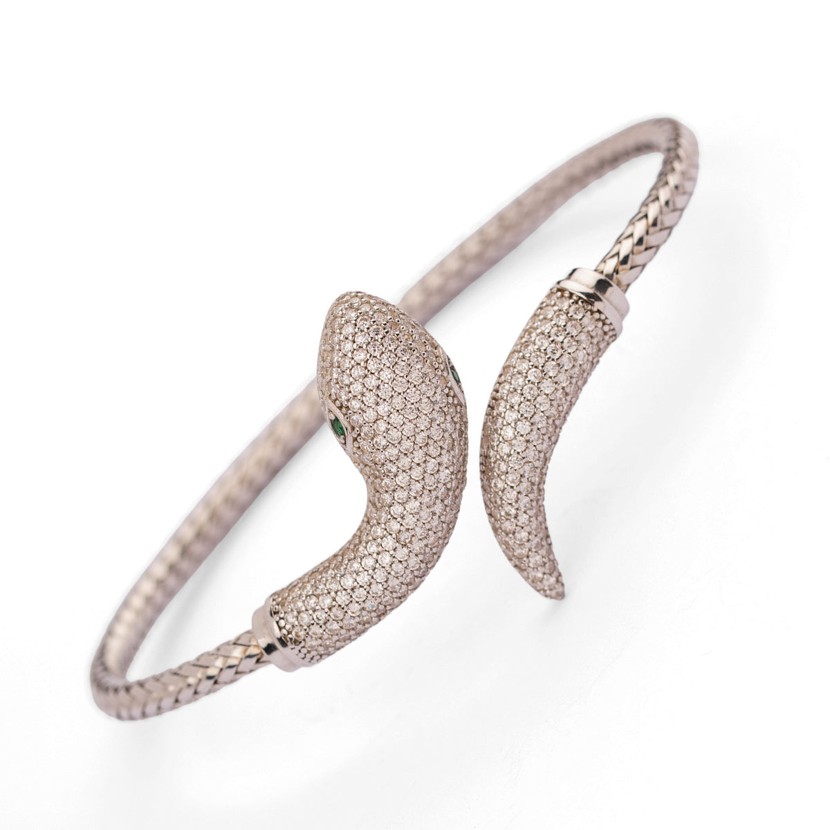 Side view of the serpent head and tapering pave tail on the Serpent Emerald Eye Pave Sterling Silver Cuff Bracelet