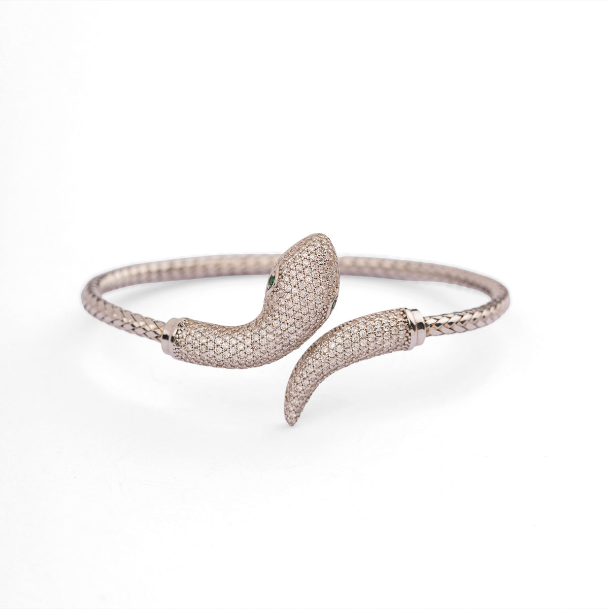 Front view of the serpent pave sterling silver cuff bracelet on white, head and tail nearly meeting