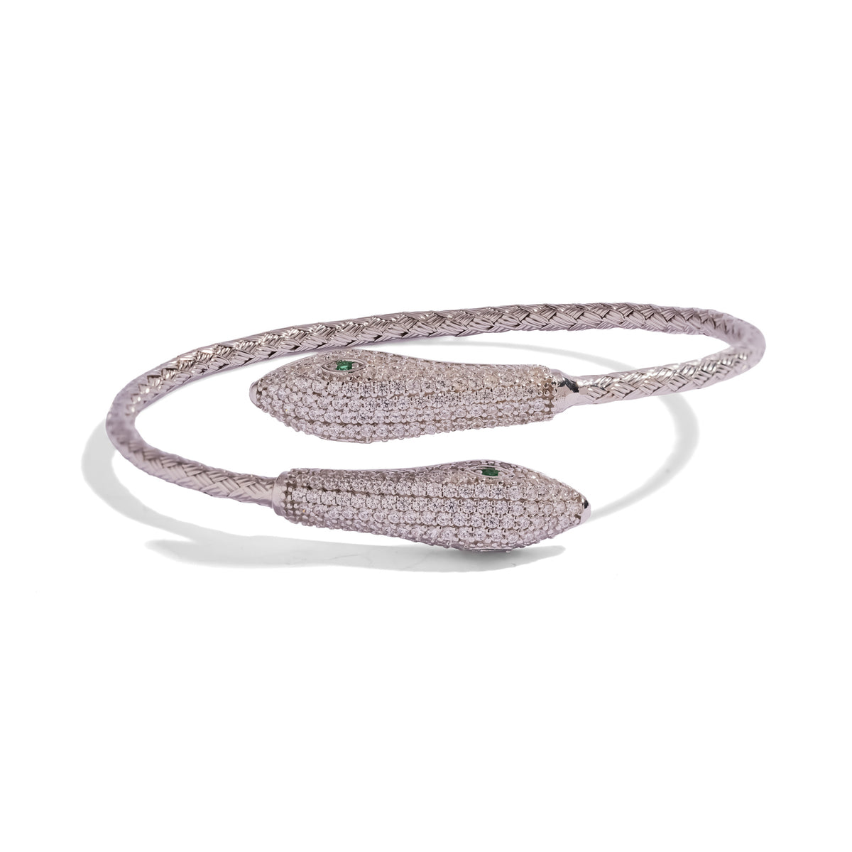 Twin Serpent Emerald Eye Pave Sterling Silver Cuff Bracelet on white, two pave white zircon serpent heads crossing on a woven silver band