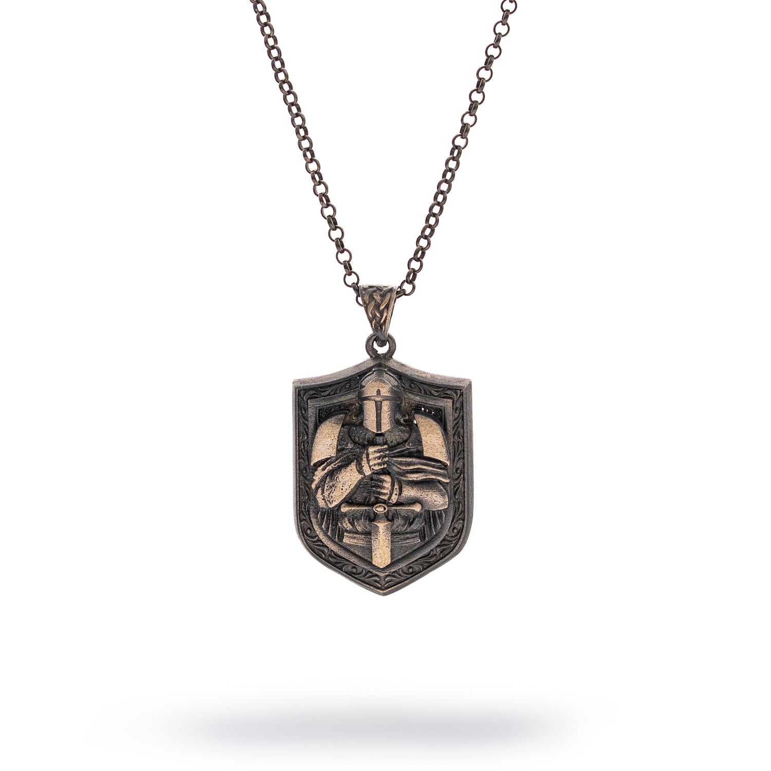 Sterling silver necklace with rhodium-plated shield pendant featuring engraved knight, 22-inch chain, masculine symbolic jewelry.