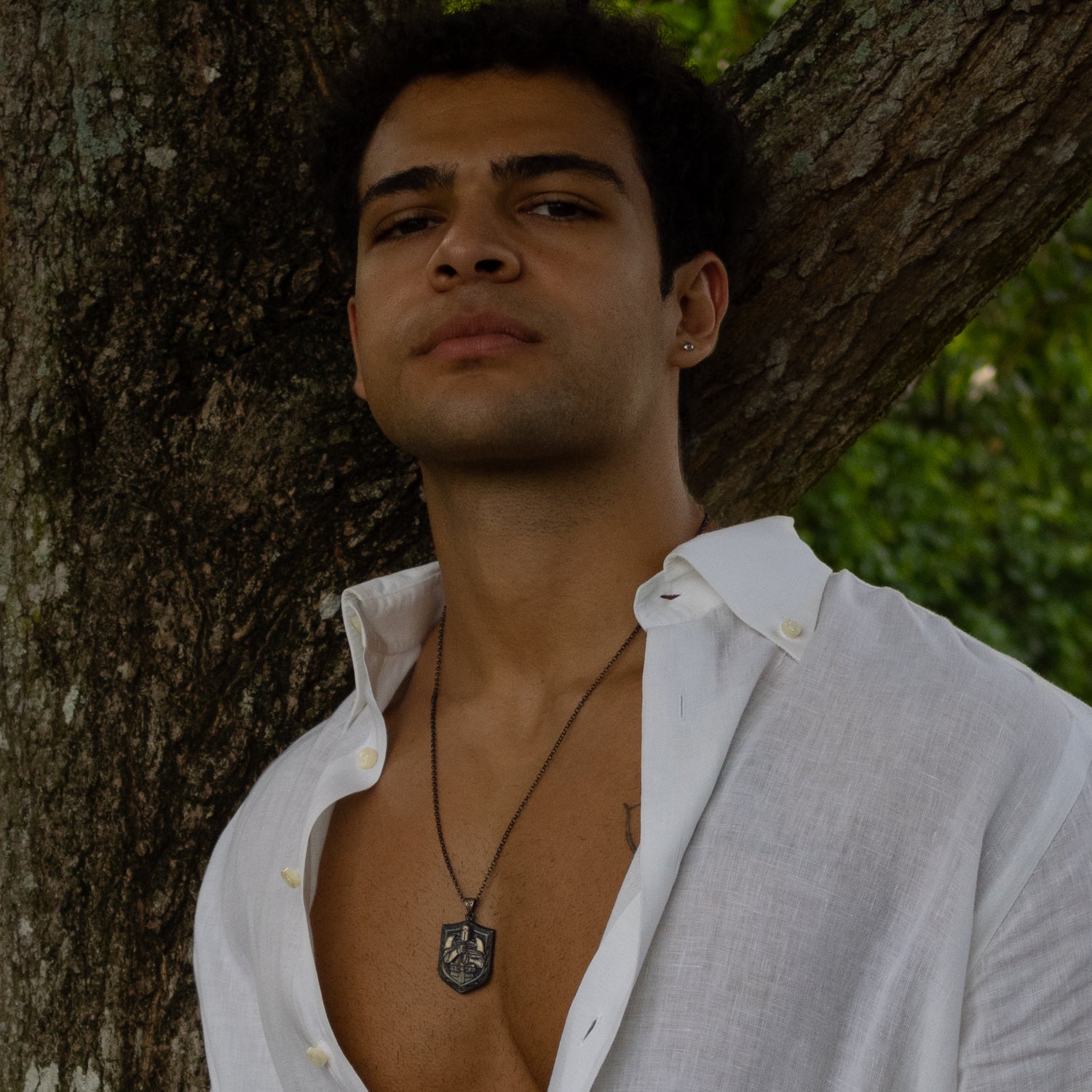 Sterling silver necklace with rhodium-plated shield pendant, engraved knight motif, 22-inch chain, masculine symbolic jewelry.