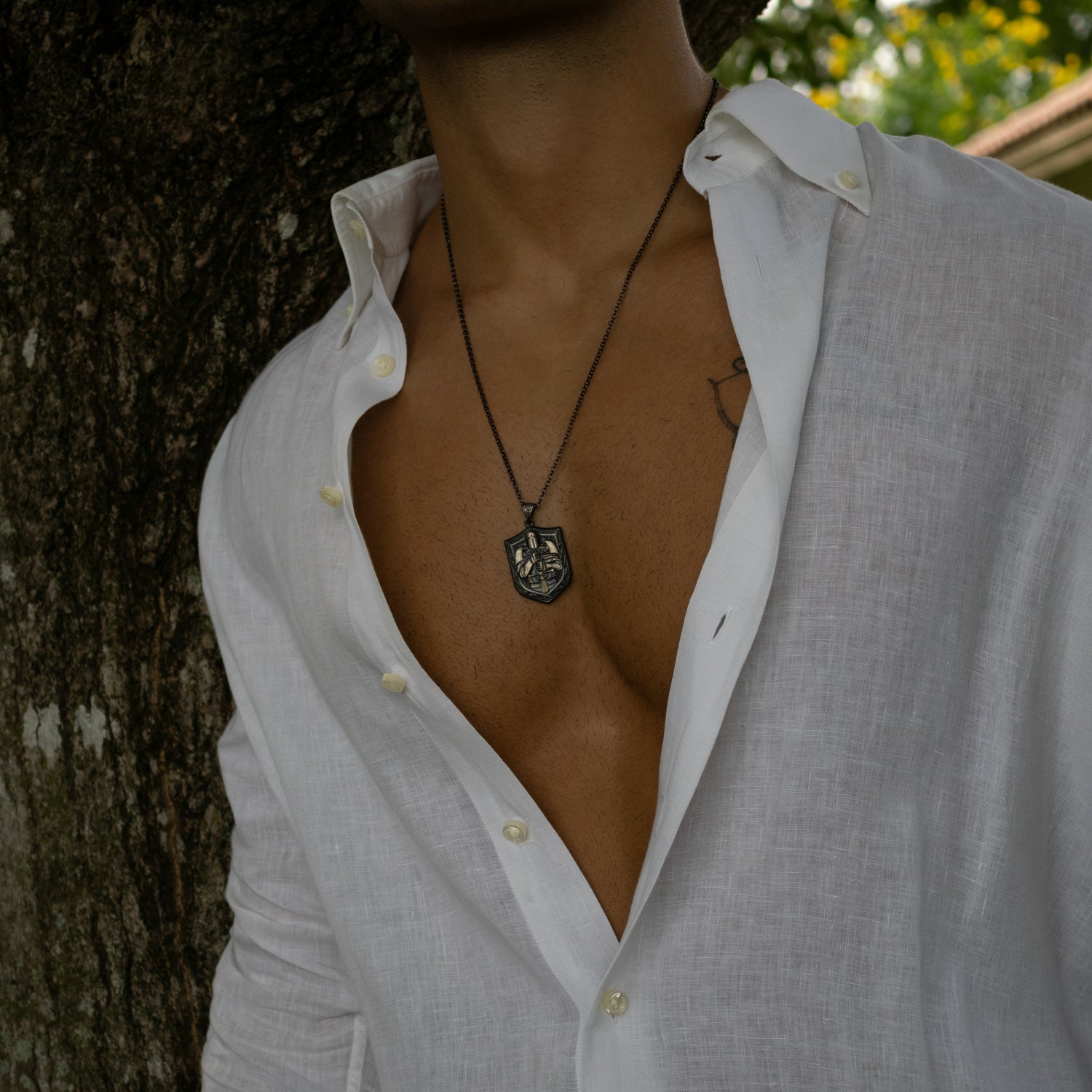 Sterling silver men’s necklace with rhodium-plated shield pendant, knight engraving, 22-inch chain, symbolic masculine jewelry.