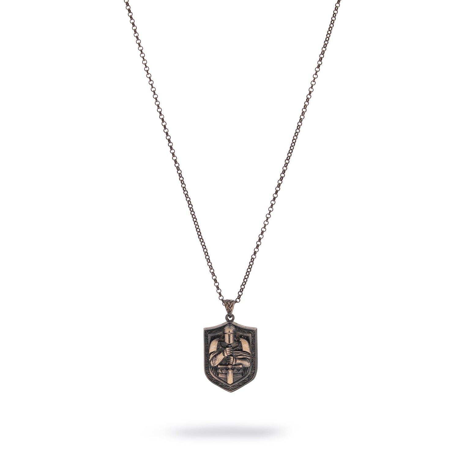 Sterling silver necklace with rhodium-plated shield pendant, engraved knight detail, 22-inch chain, men’s bold symbolic jewelry.