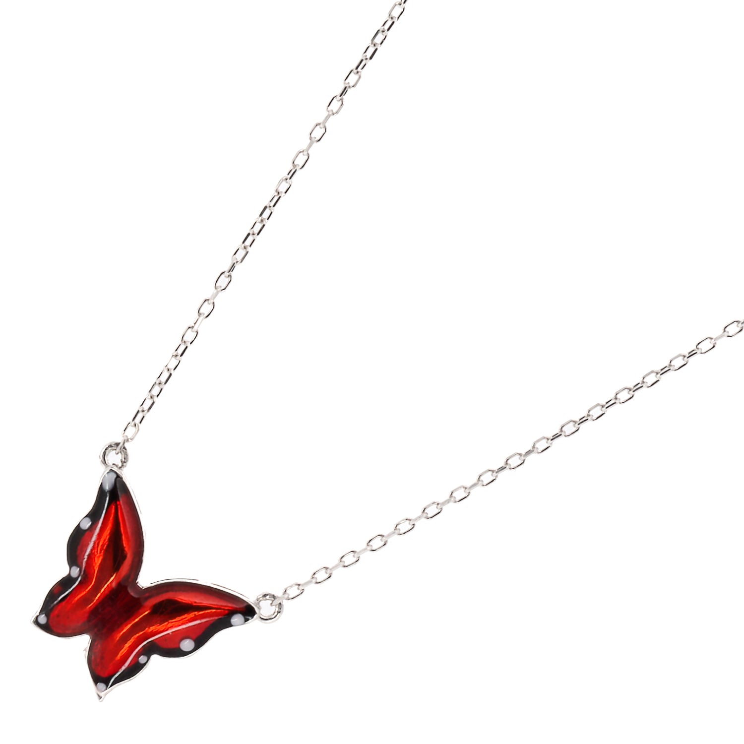 Silver Joy Red Enamel Butterfly Necklace, a handmade piece of jewelry that inspires spiritual growth and self-transformation.