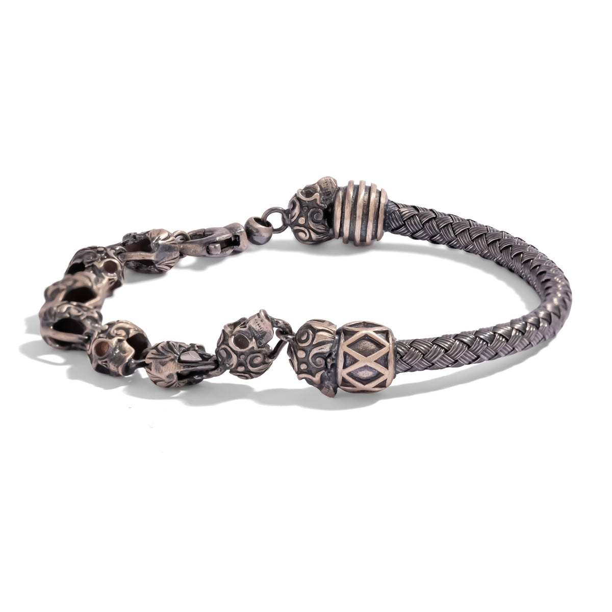 Skull Bead Braided Oxidized Sterling Silver Bracelet with a braided band on one side and engraved skull links with a lobster clasp on the other