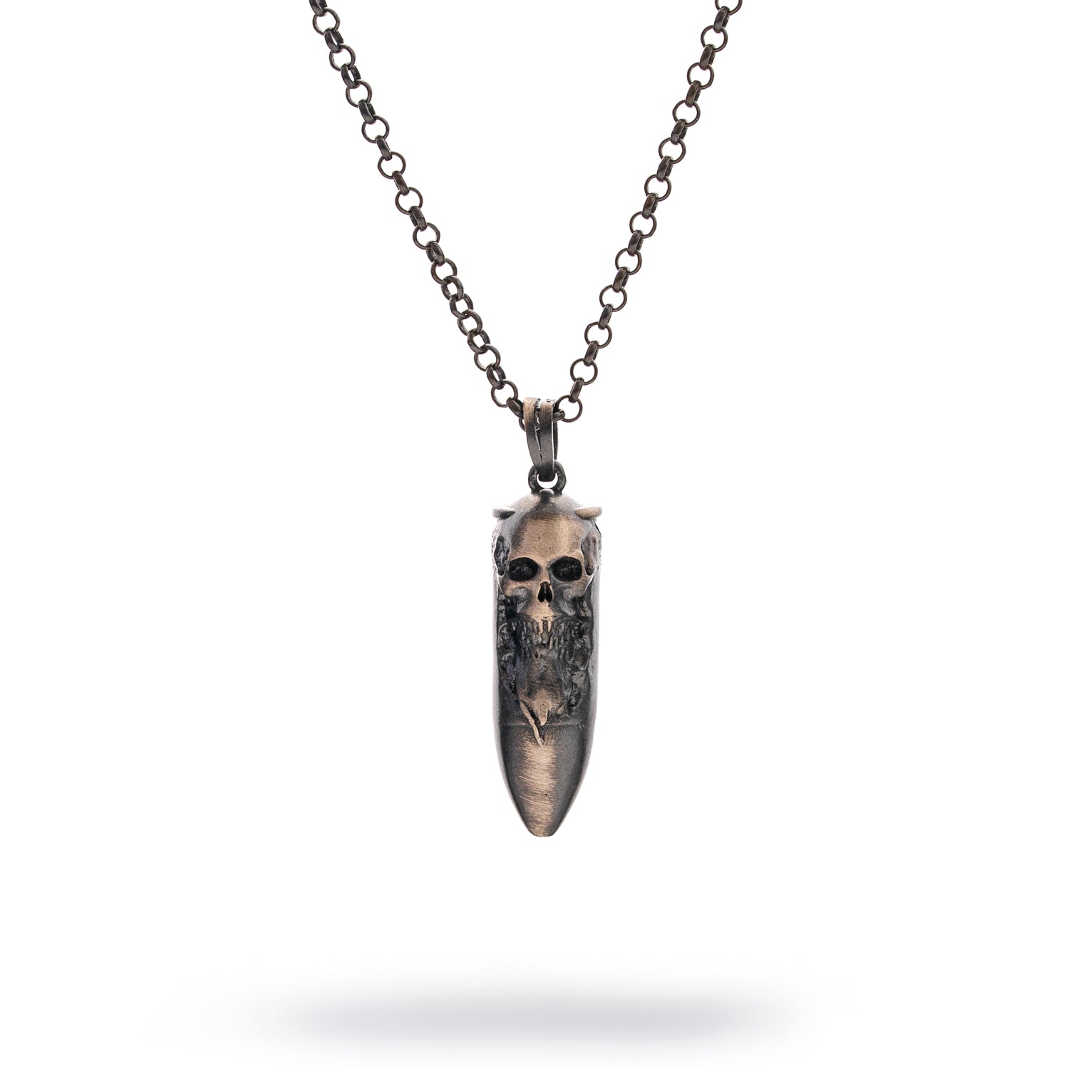 Sterling silver necklace with dark rhodium finish, featuring a skull and fang pendant on a 26-inch chain.