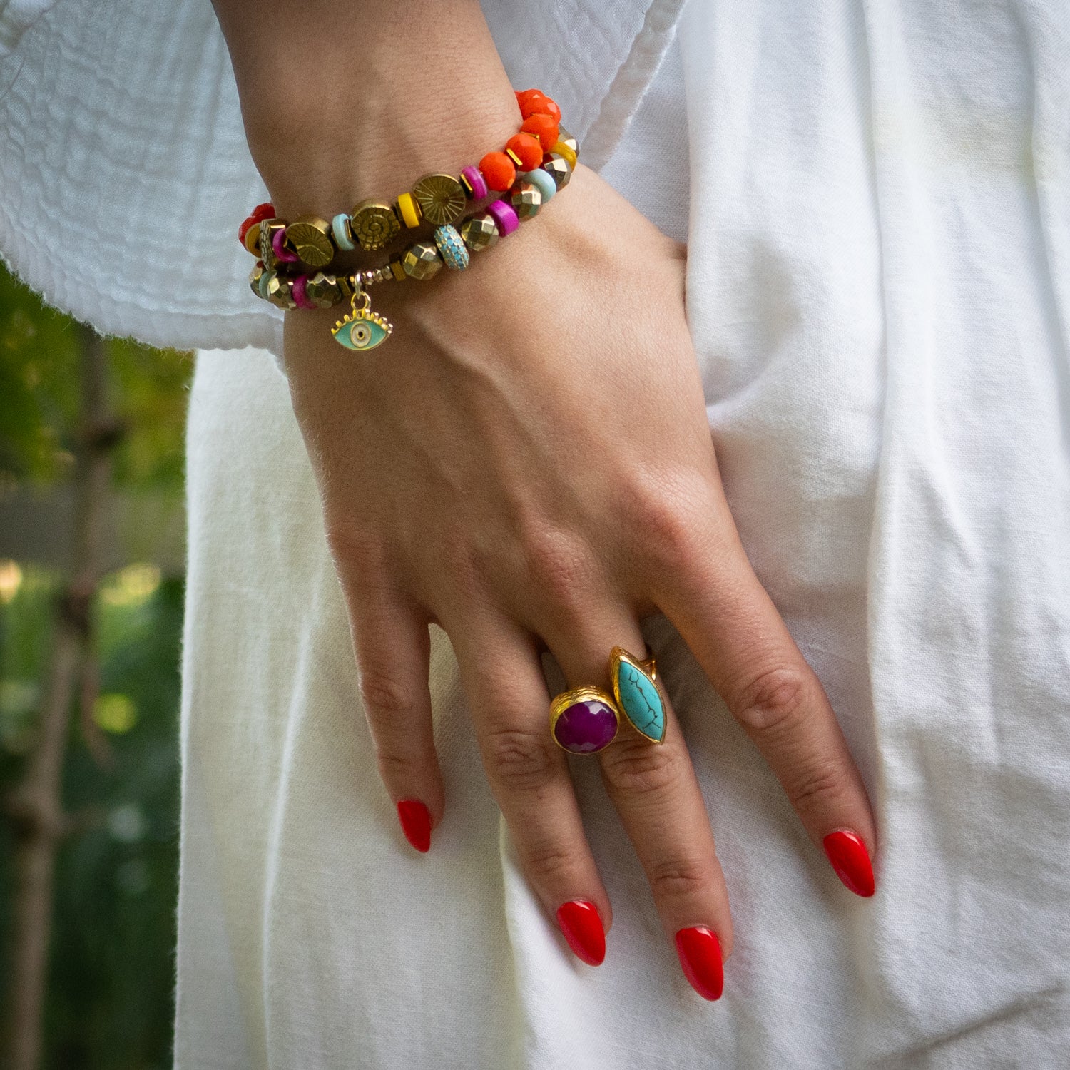 Adjustable artisan ring combining protective turquoise and empowering ruby for daily wear

