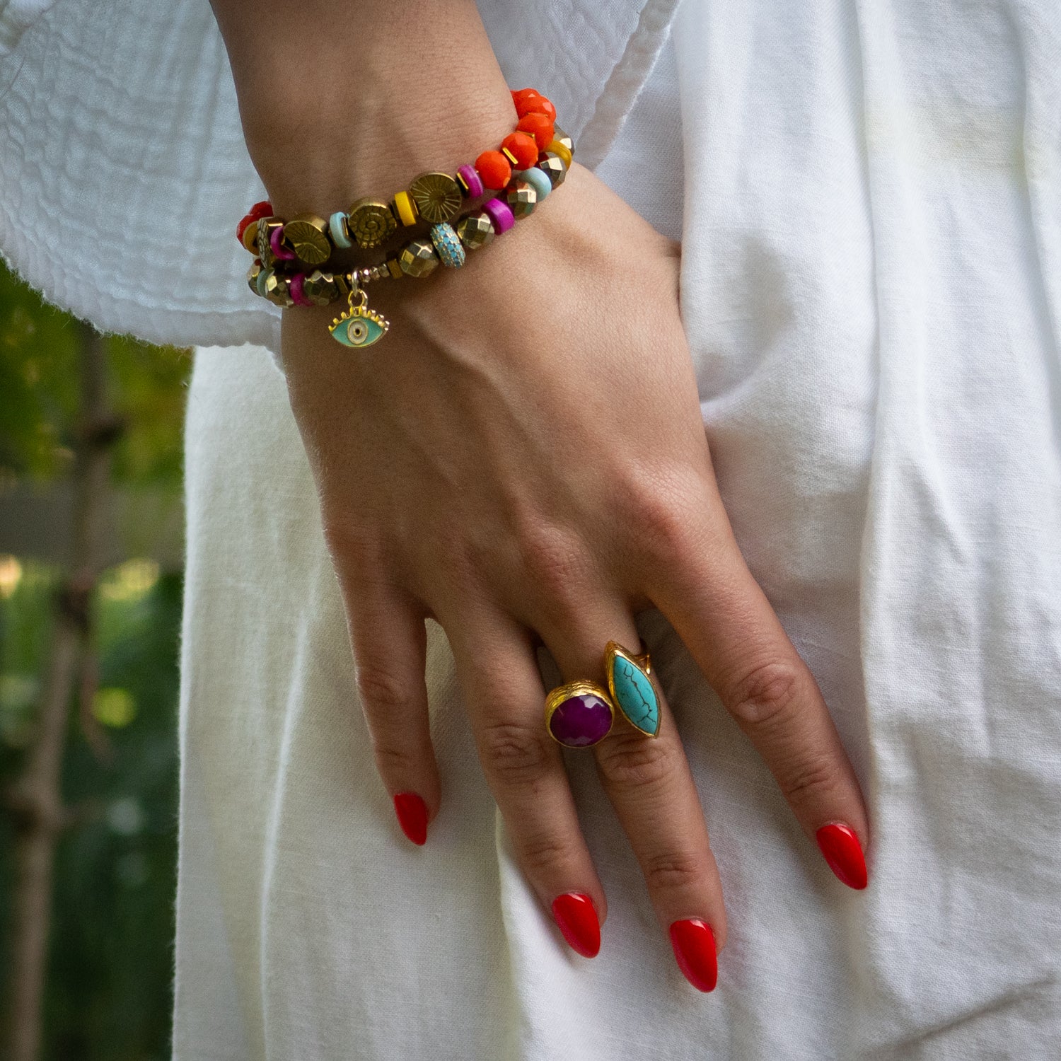 Gold-plated ring with vibrant natural gemstones for personal empowerment and clarity

