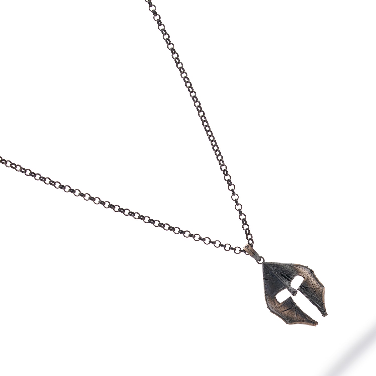 Sterling silver necklace with Spartan helmet pendant, rhodium and oxidized black finish, bold masculine style symbolizing courage and honor.