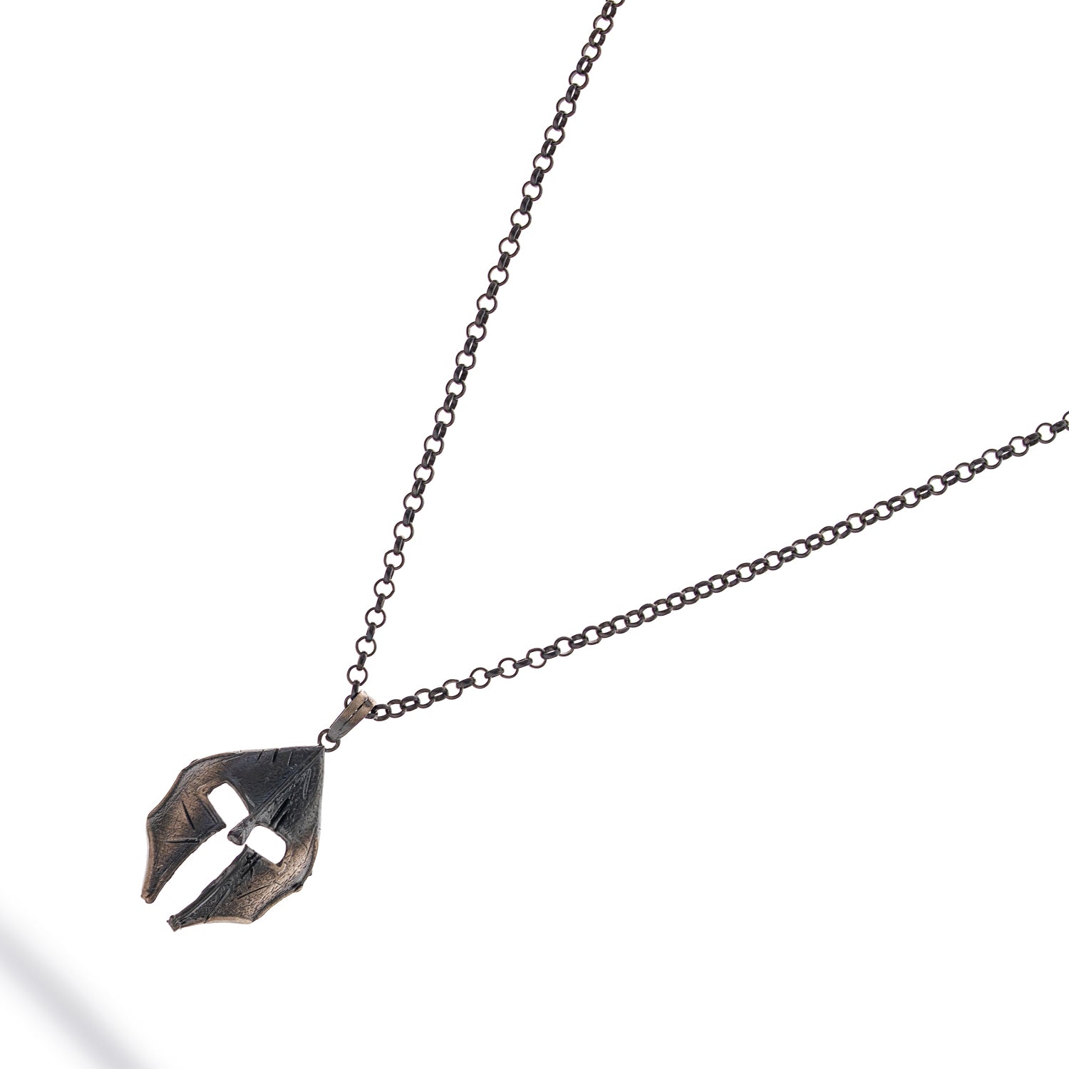 Sterling silver necklace with Spartan helmet pendant, rhodium and oxidized black finish, bold masculine style, symbolizing courage and honor.
