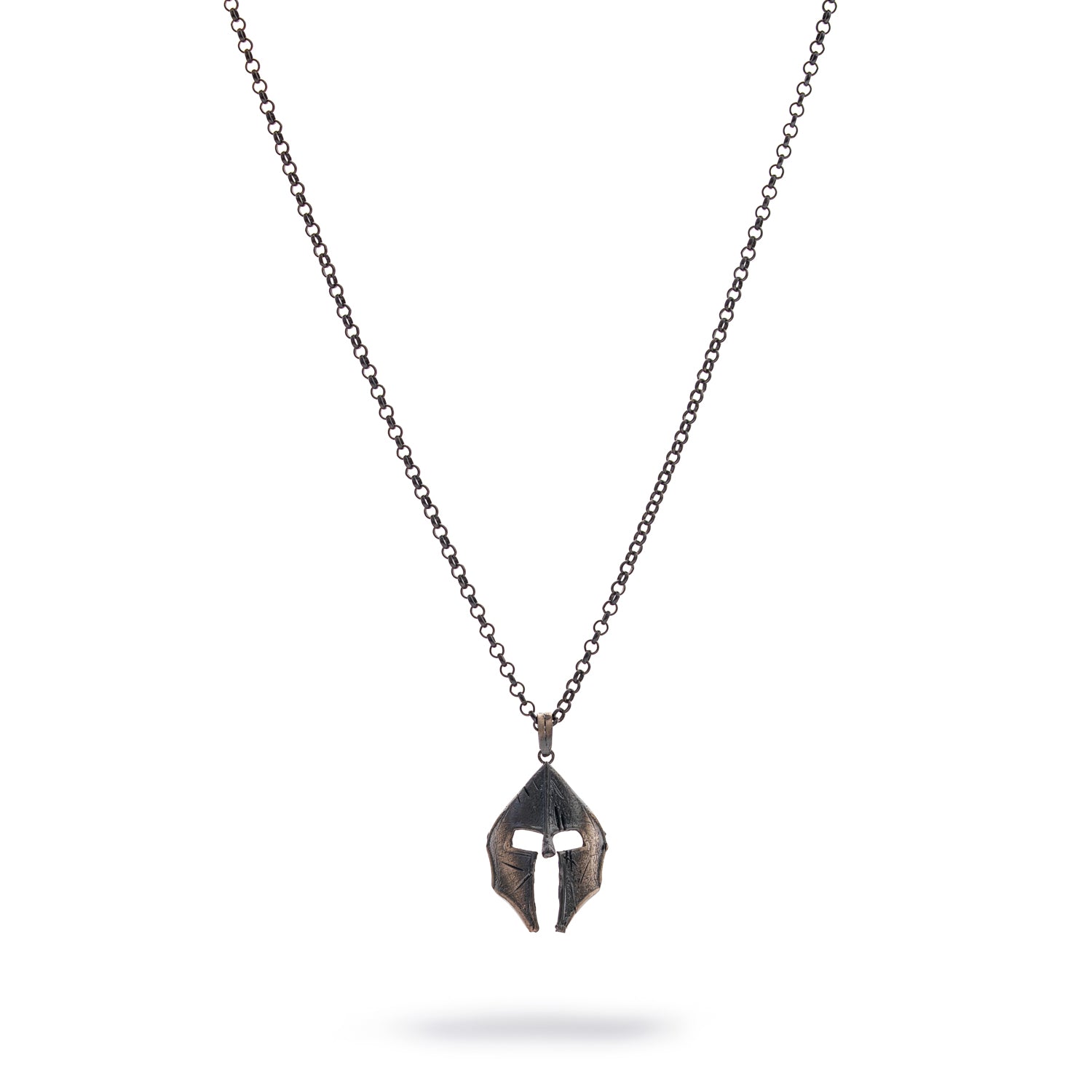 Sterling silver necklace with Spartan helmet pendant, rhodium and oxidized black finish, bold masculine style symbolizing courage and honor.
