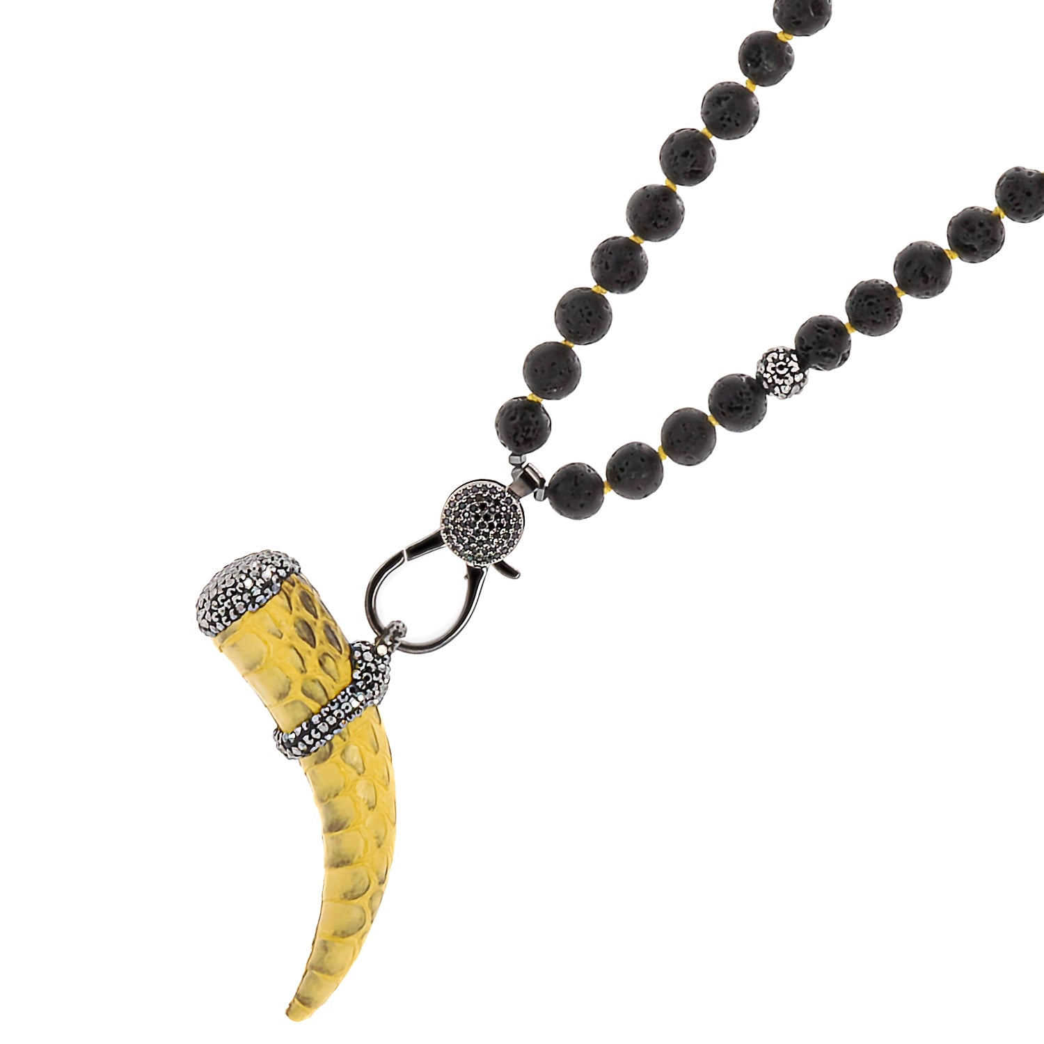 Detail shot of the intricate Cornicello pendant, crafted with attention to detail and symbolic significance.