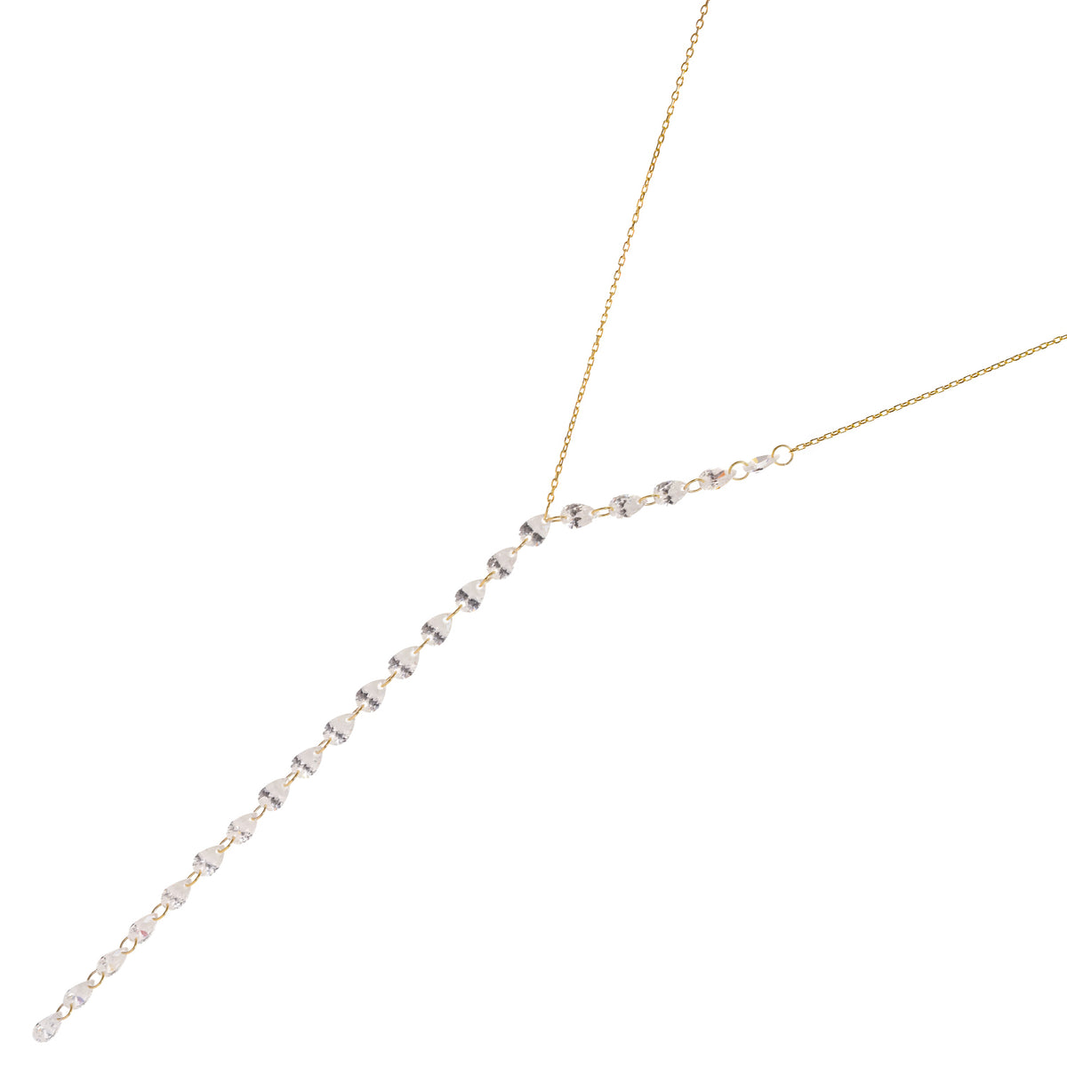 Starlight Pear Zircon Y Drop Gold Necklace laid at an angle, showing the individually linked pear zircons