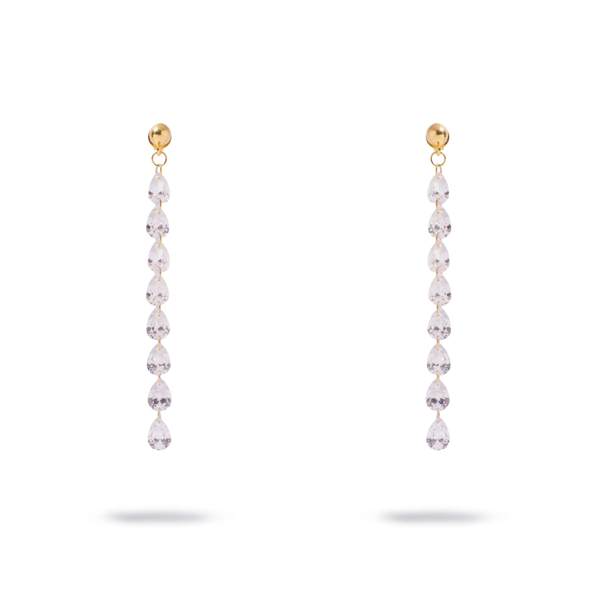 Front view of the Starlight pear cut zircon gold drop earrings on white
