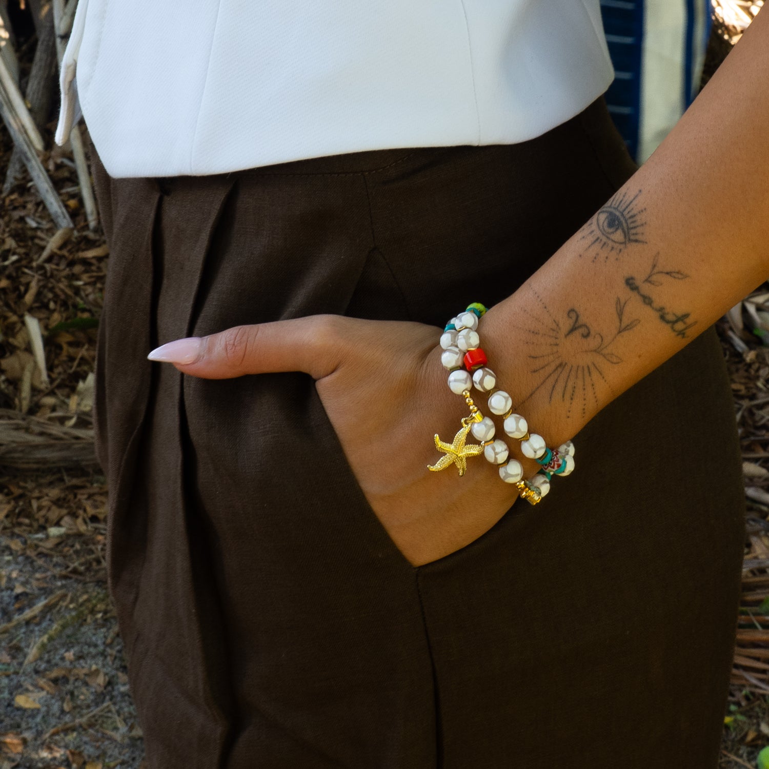 Close view of summer beach starfish white agate bracelet set on wrist
