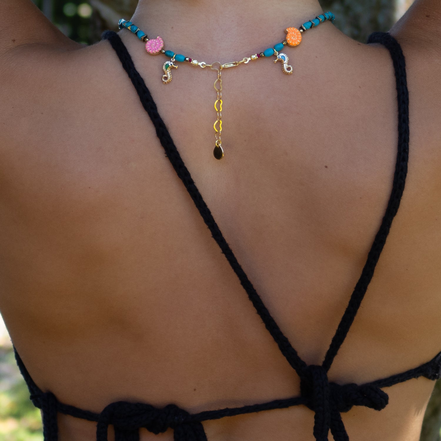 Beachy choker necklace with playful seahorse charms and radiant summer energy


