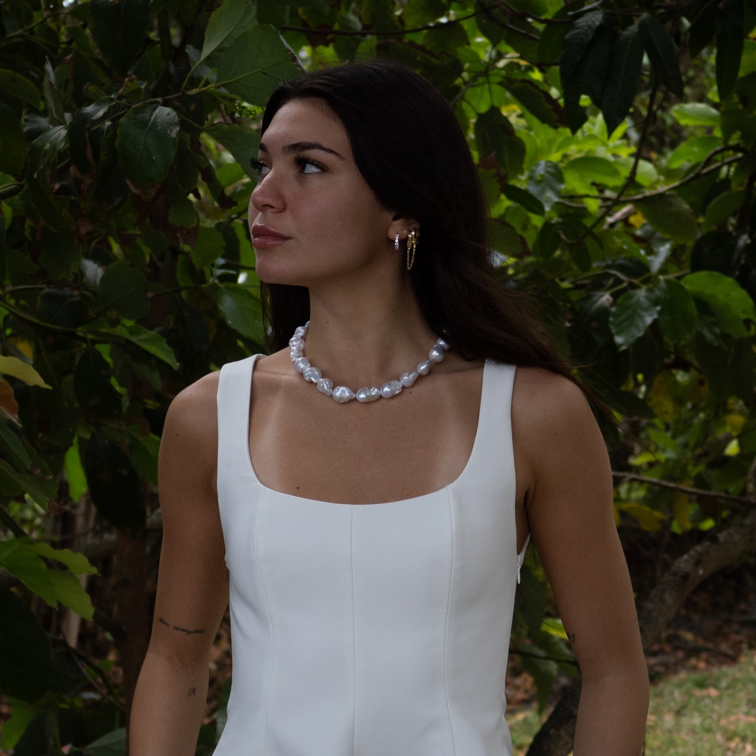 Statement pearl necklace celebrating imperfection and luxurious design

