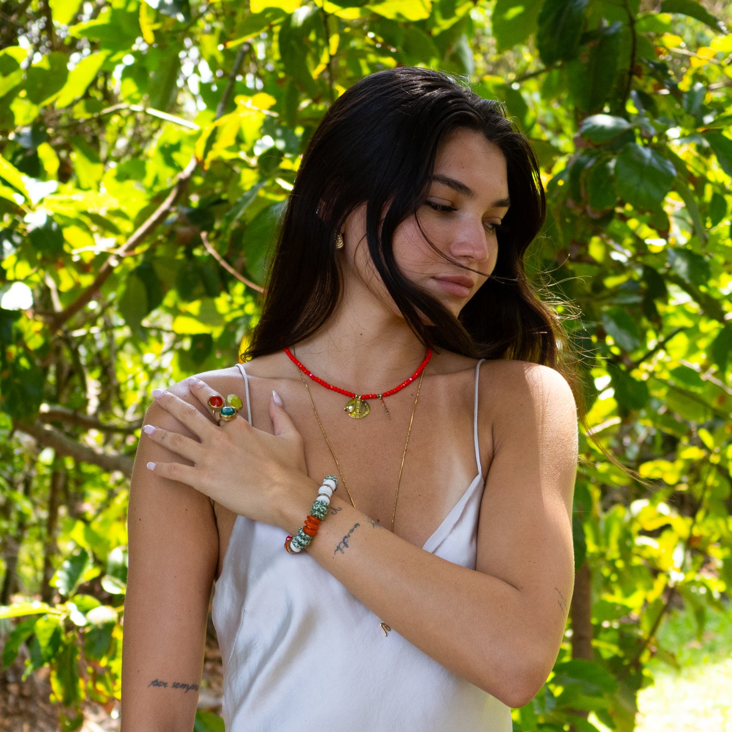 African-style ceramic bead bracelet with central red bead for courage and vitality.

