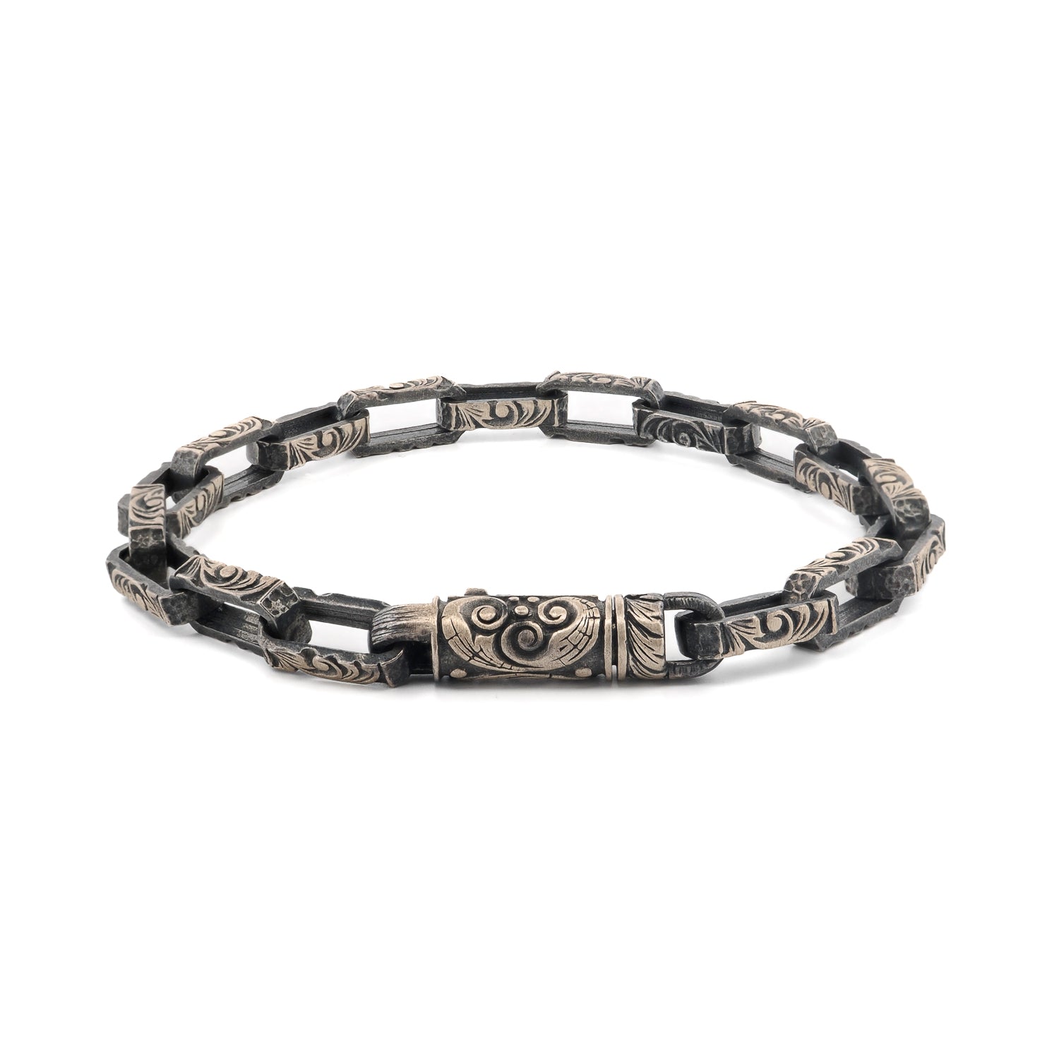 Tribal men’s sterling silver bracelet with rugged chain links and engraved details
