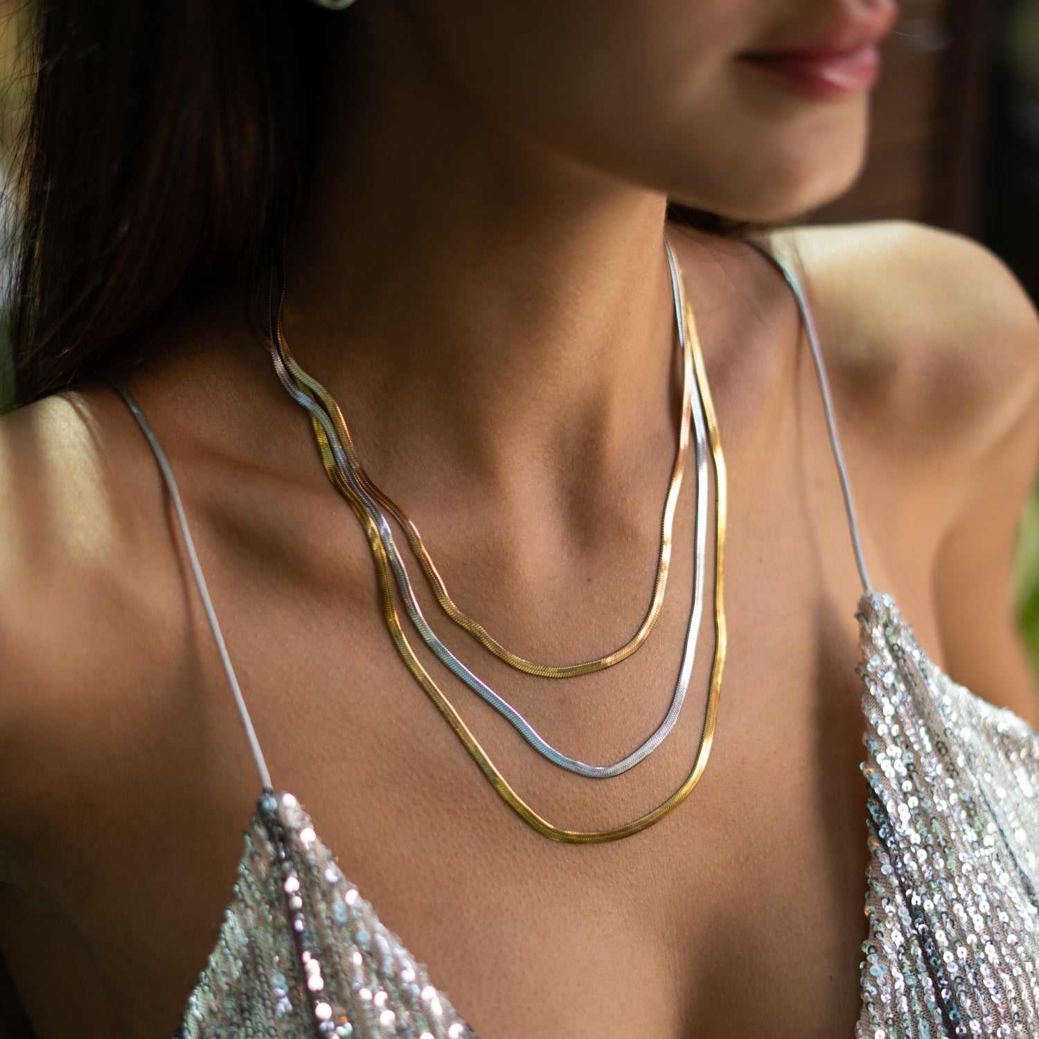 Statement layered necklace with three metallic finishes and extender