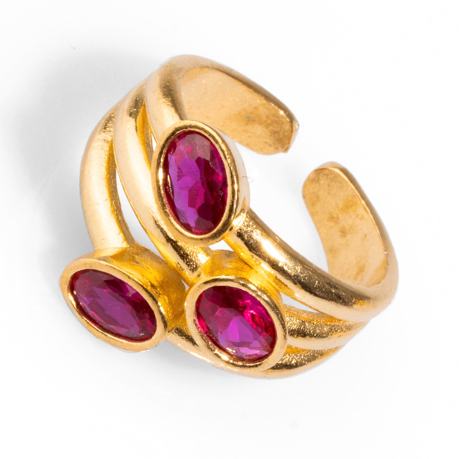 Stylish adjustable ring showcasing three vibrant ruby gemstones, crafted in 24k gold-plated brass for a touch of sophistication.
